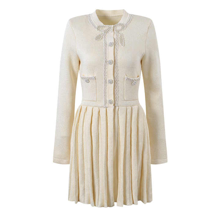 White A-line silhouette with fitted bodice button-down pleated skirt tailored for a flattering shape elegant sophisticated look lightweight knitted fabric embellished buttons pockets suitable for formal events classic contemporary style