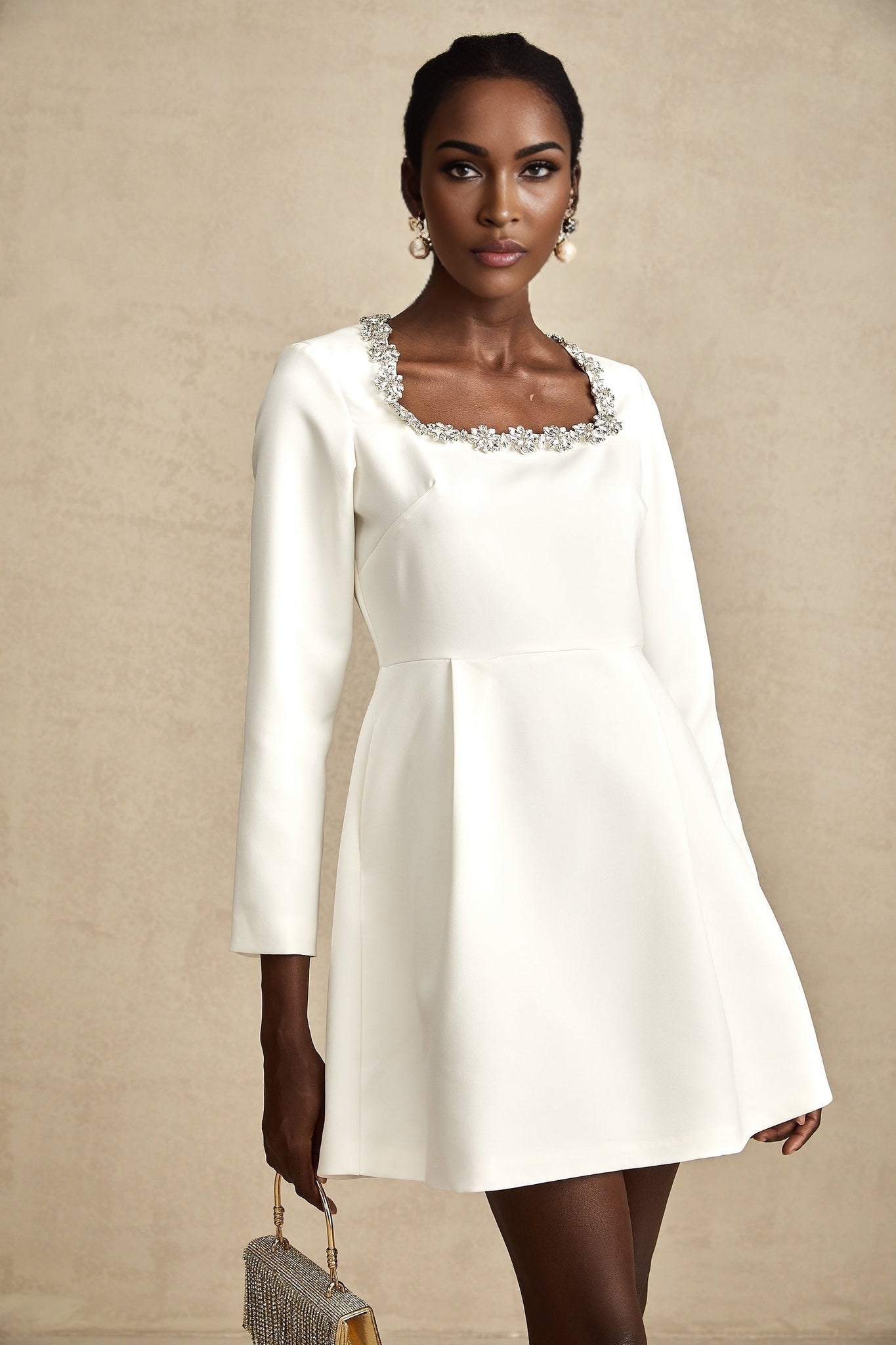 White Aline mini dress with crystal embellishments named Angelique