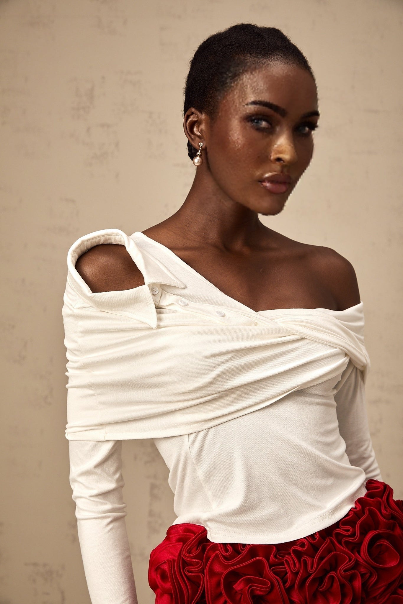 White asymmetric twisted jersey top with one shoulder design