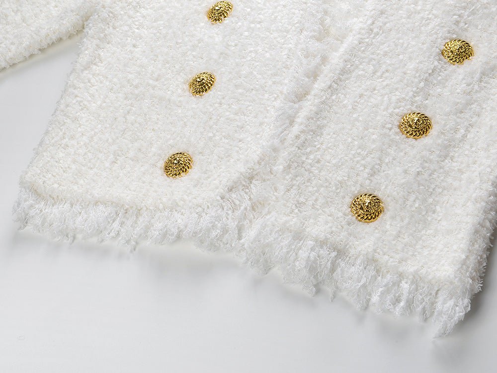 White double-breasted blazer and skirt set with fringed edges and gold button details
