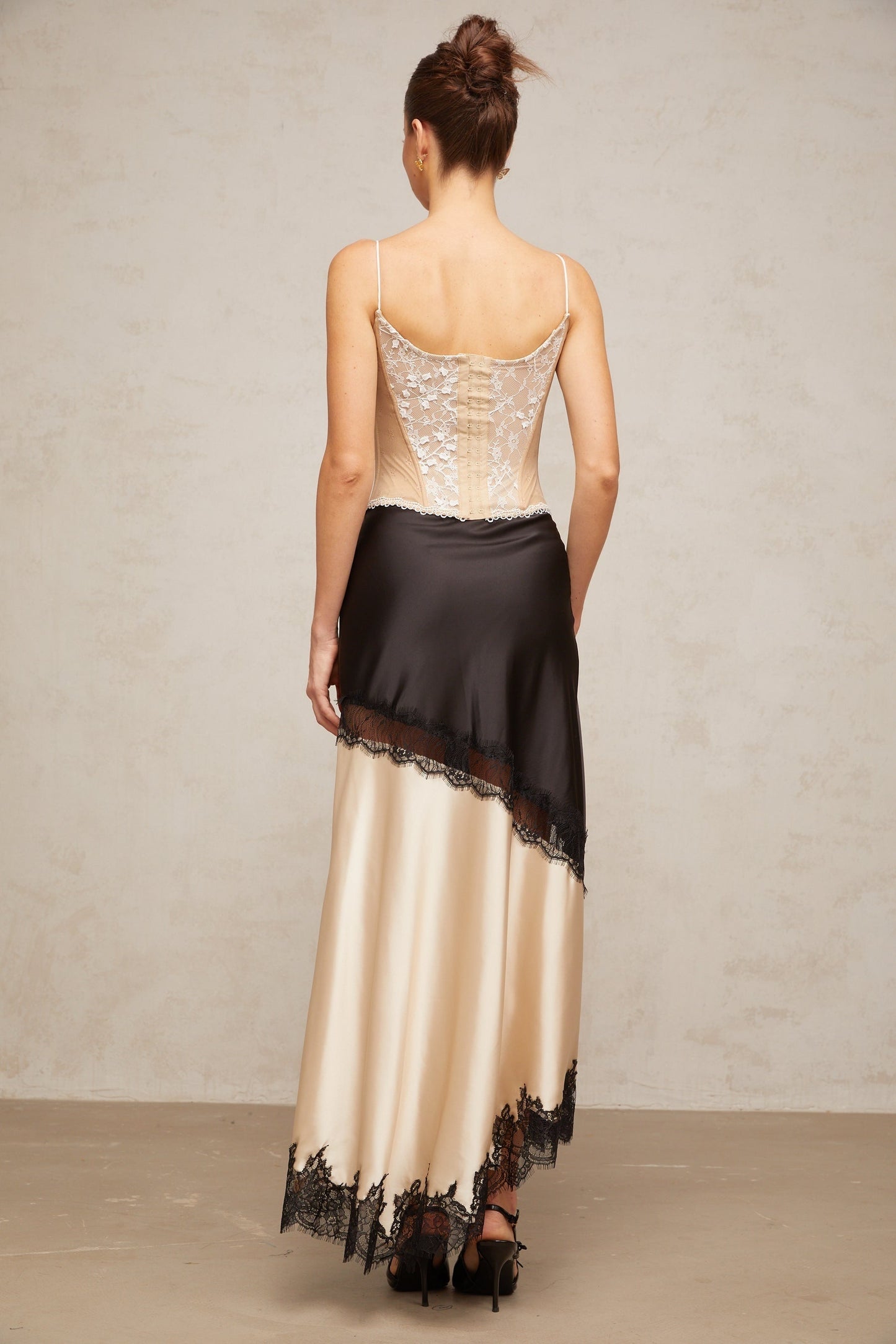 White bustier top with floral lace panels and sweetheart neckline