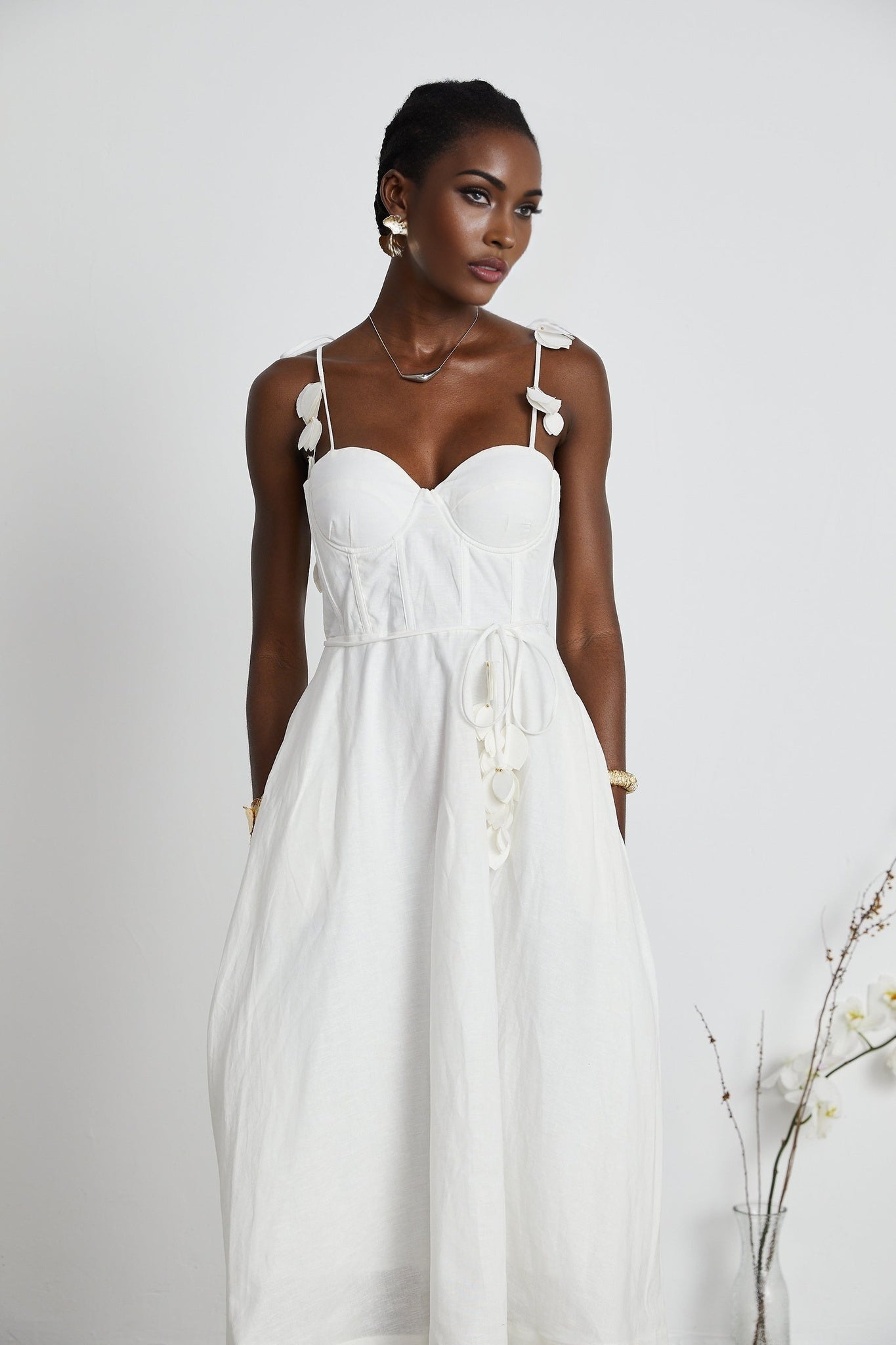White corset style midi dress named Helene with fitted bodice and flowing skirt