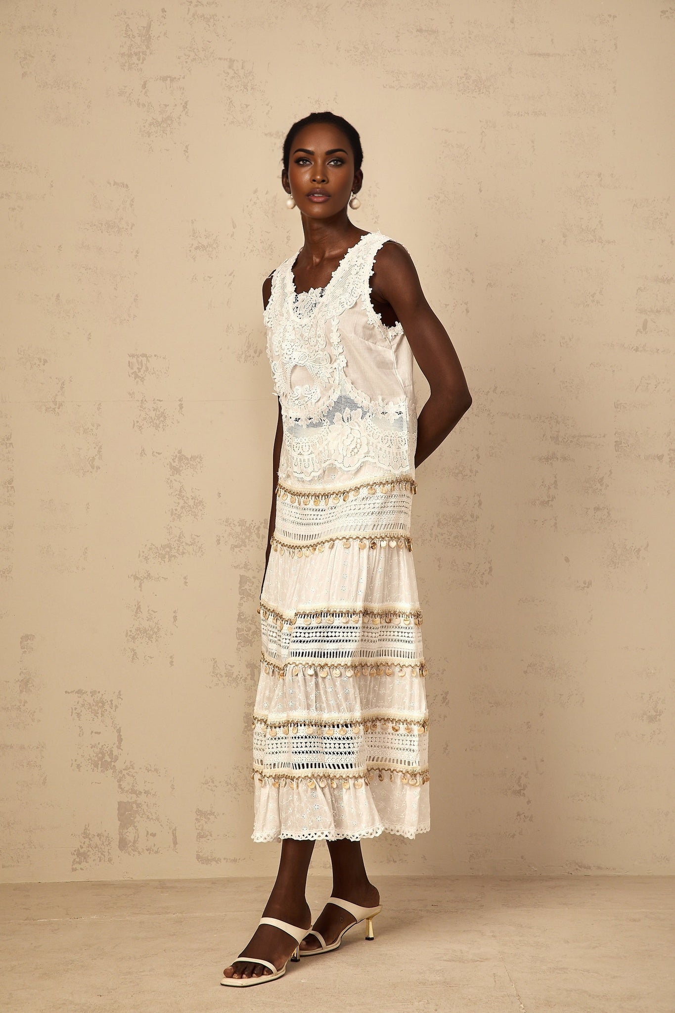 White cropped tank top with floral embroidery called Theoline