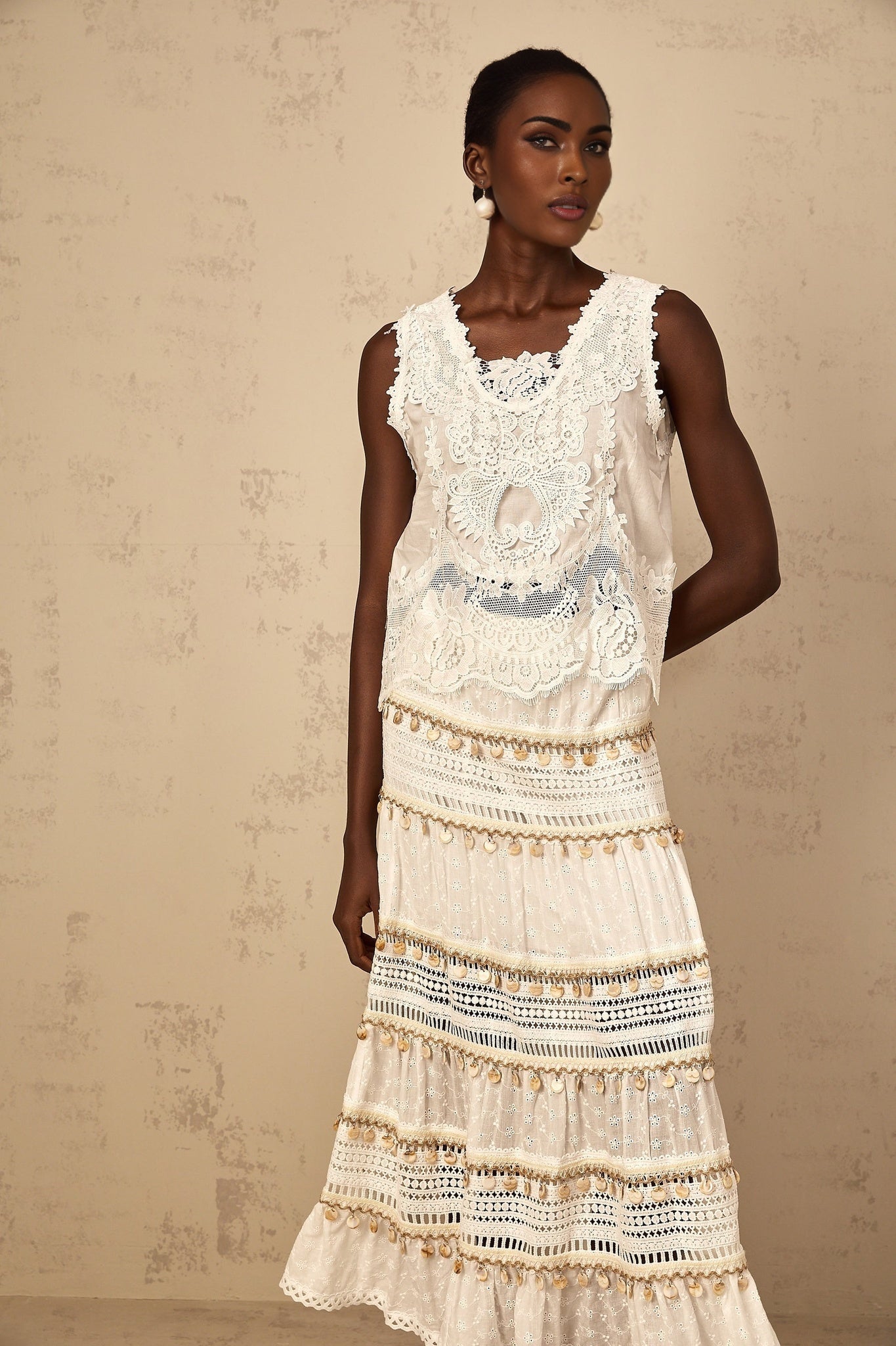 White cropped tank top with floral embroidery detail called Théoline