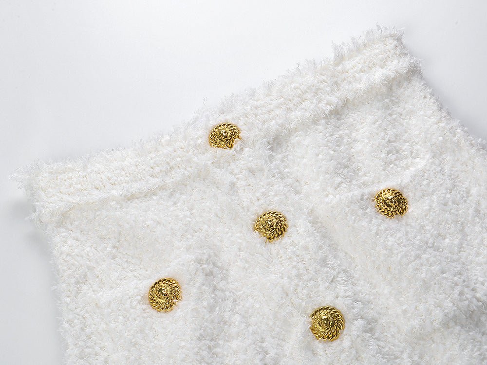 White double-breasted blazer and skirt set with fringed edges and gold button details