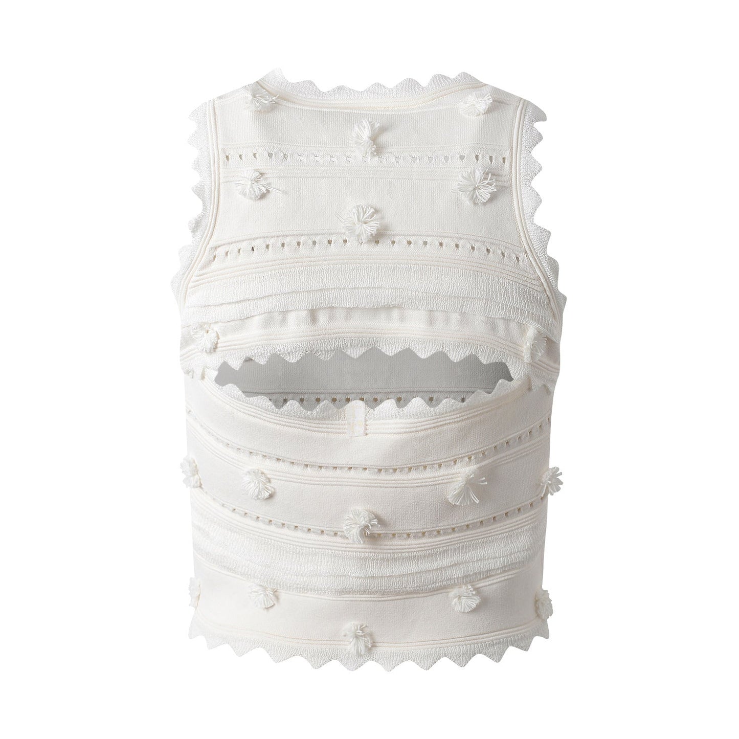White embroidered cropped top and high-waisted skirt with scalloped edges and eyelet accents