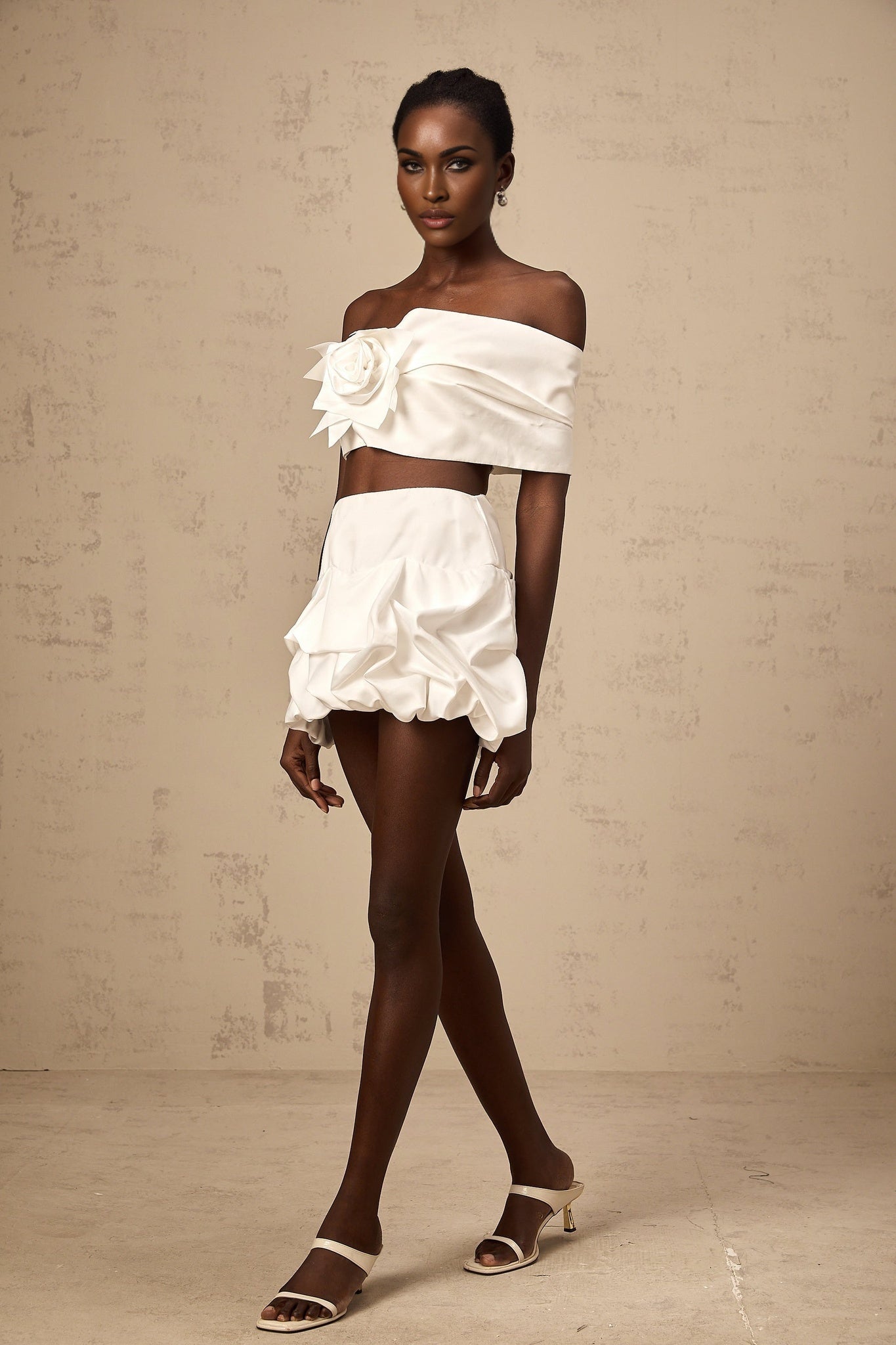 White floral print matching set with pleated top and skirt by Honorine