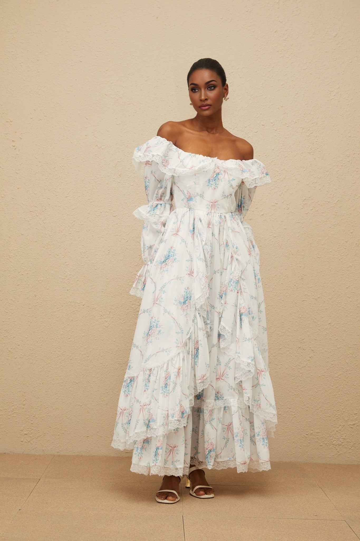 White off the shoulder floral print maxi dress with flared cuffs and lace trim