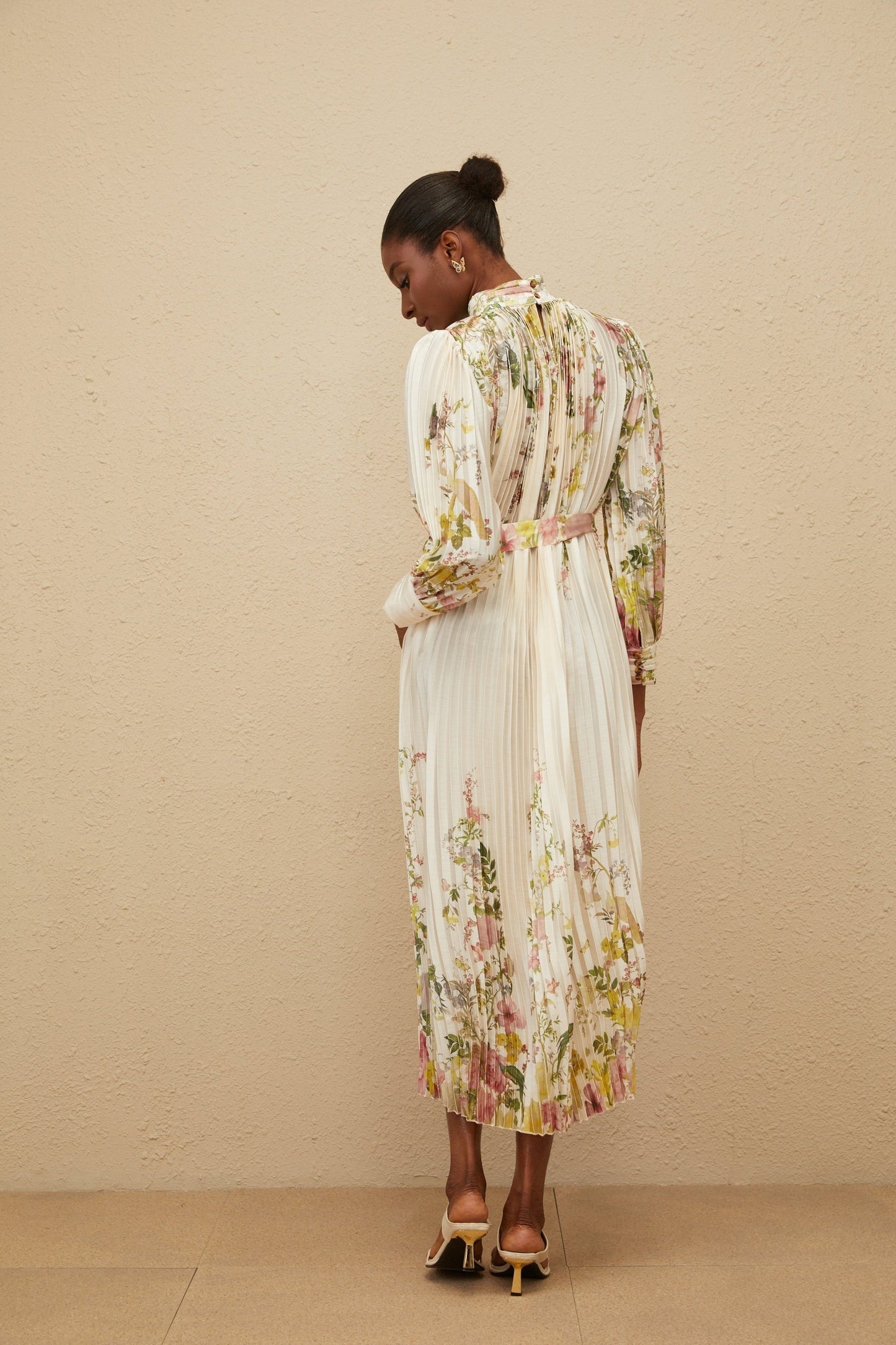 White floral print turtleneck midi dress with cinched waist and pleats