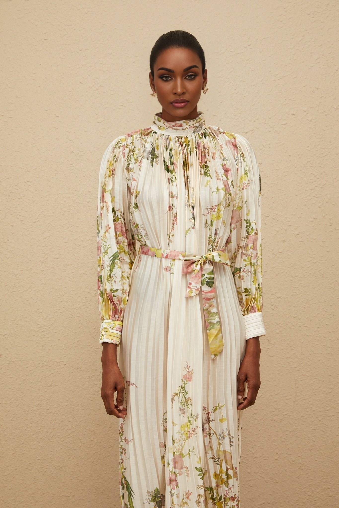 White floral print turtleneck midi dress with cinched waist and buttoned cuffs