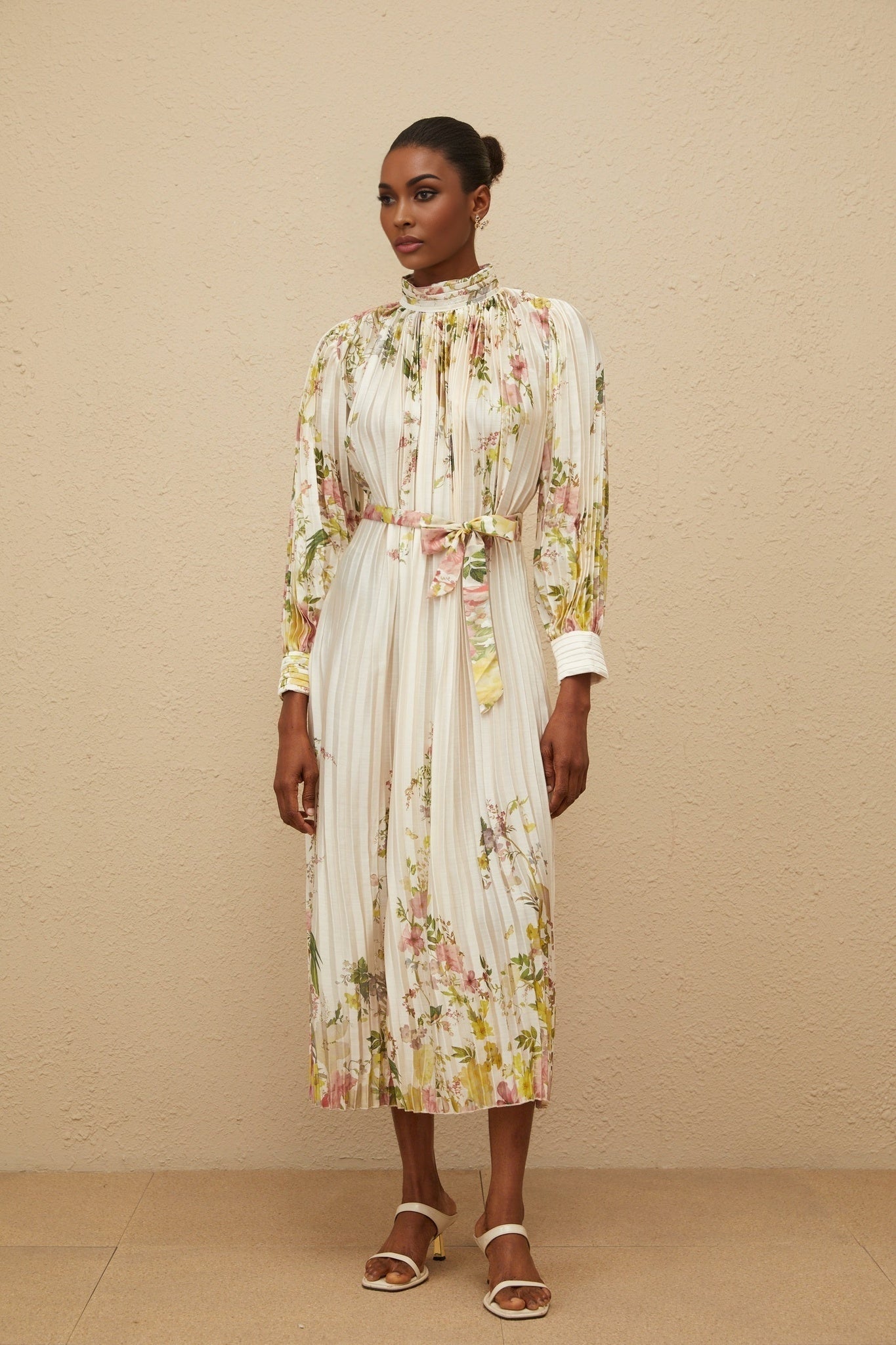 White floral print turtleneck midi dress with cinched waist and buttoned cuffs