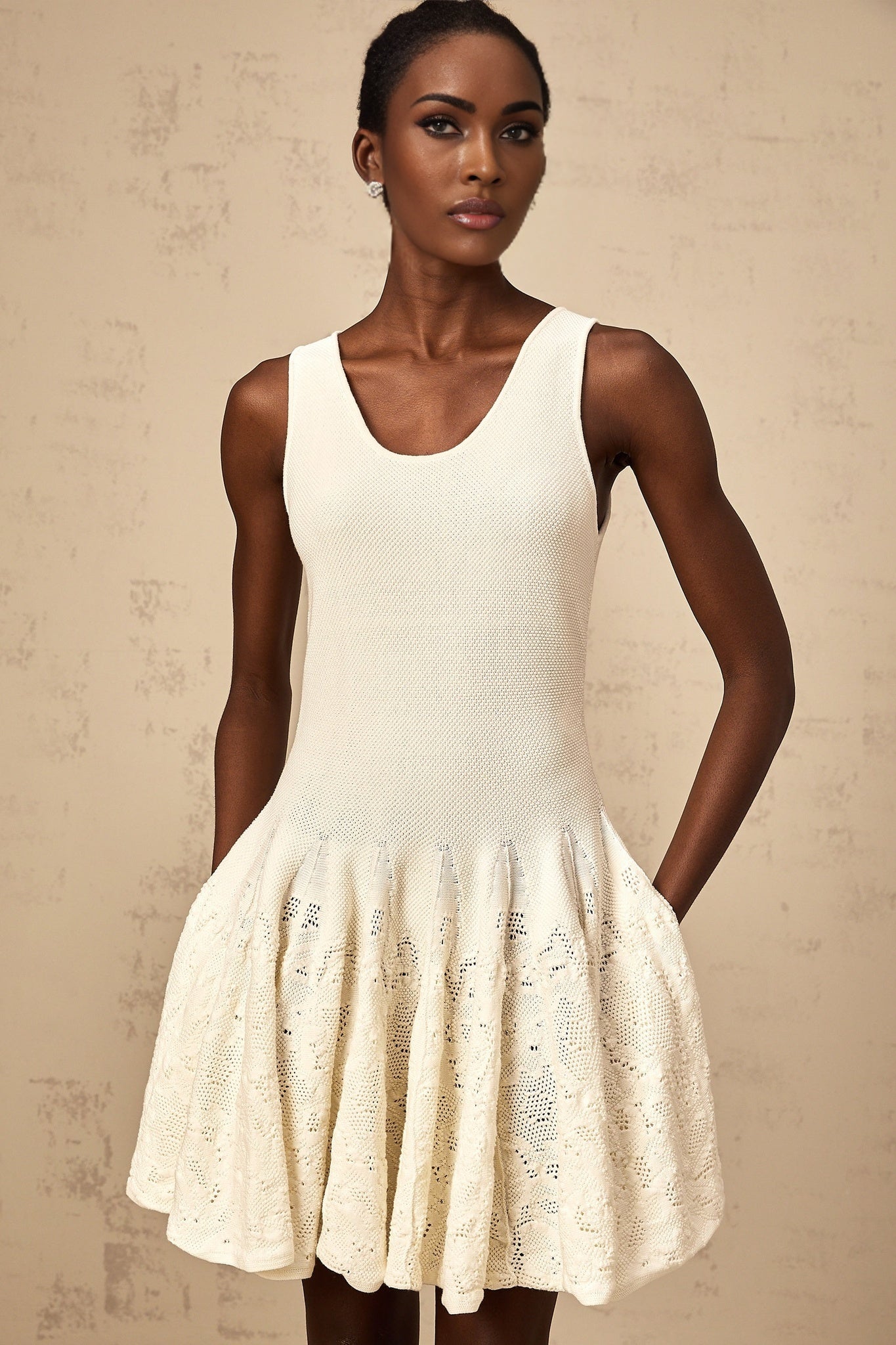 White jacquard knit mini dress with short sleeves and fitted silhouette named Eleonore