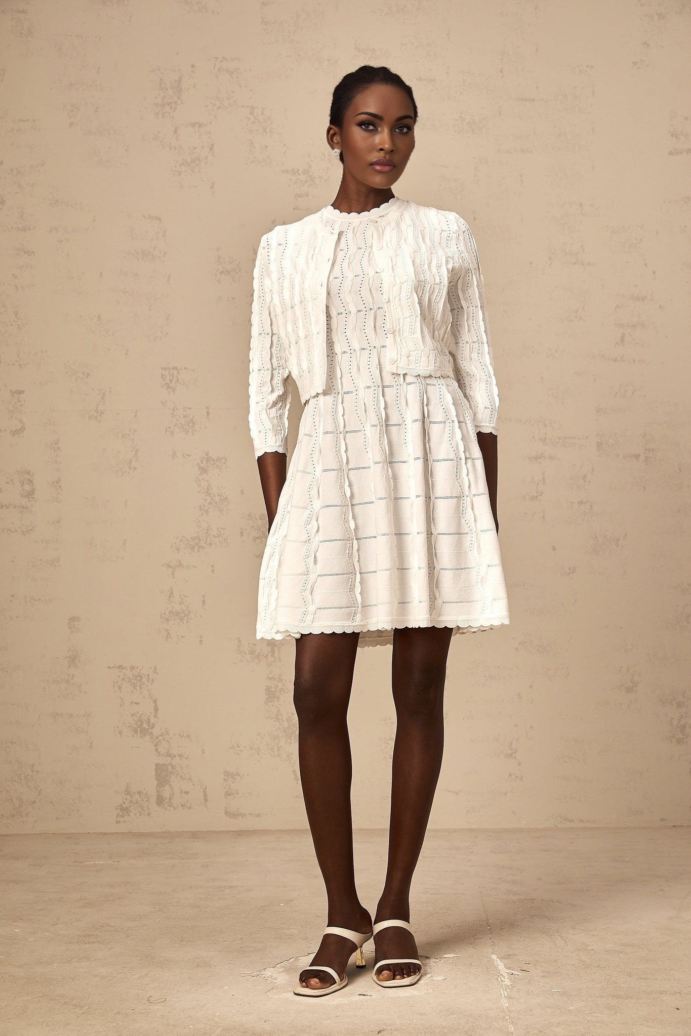 White knitted cardigan with ruffled details named Esmee