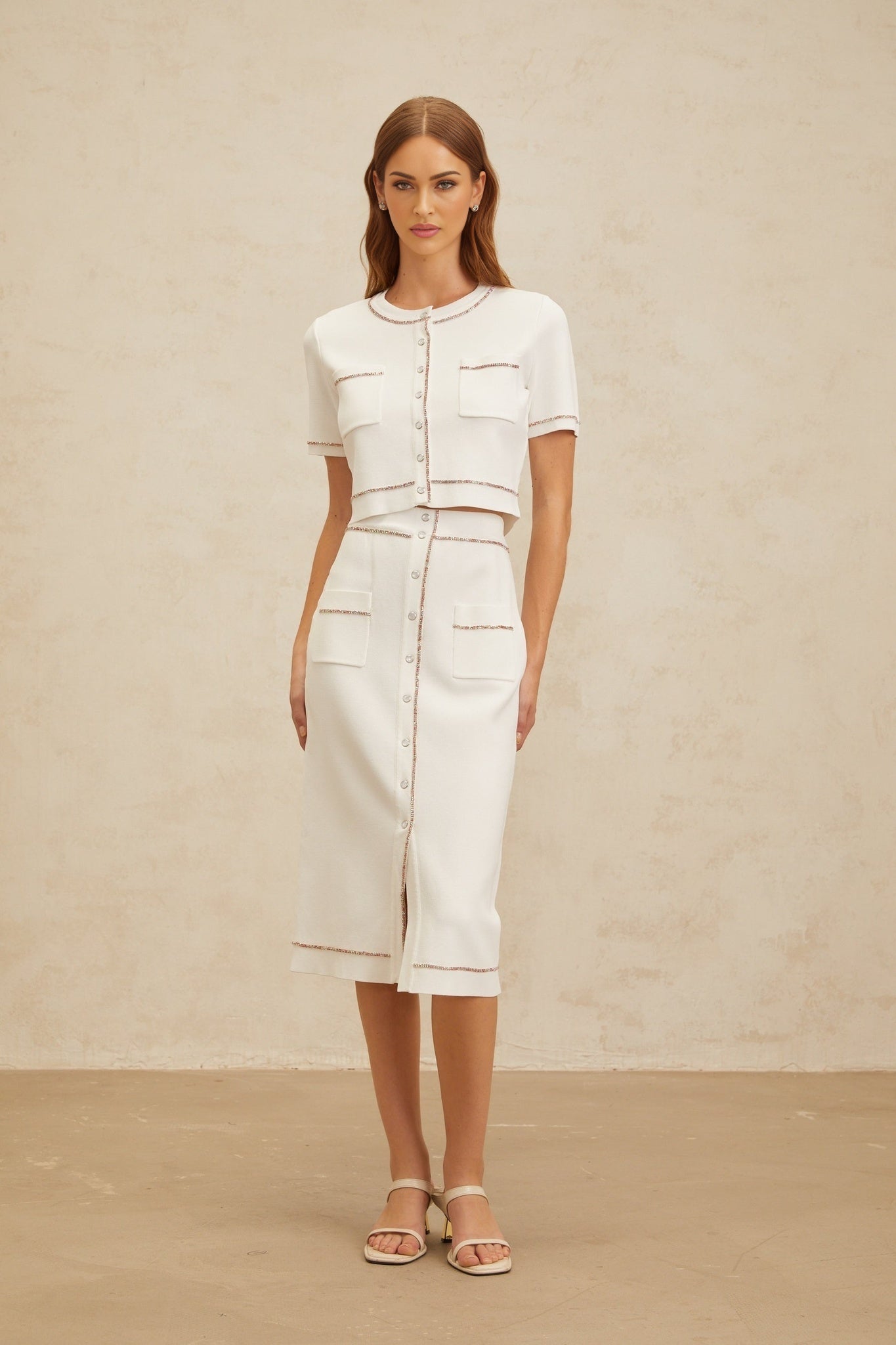 White knitted top and skirt set with crystal embellishment and ribbed hem