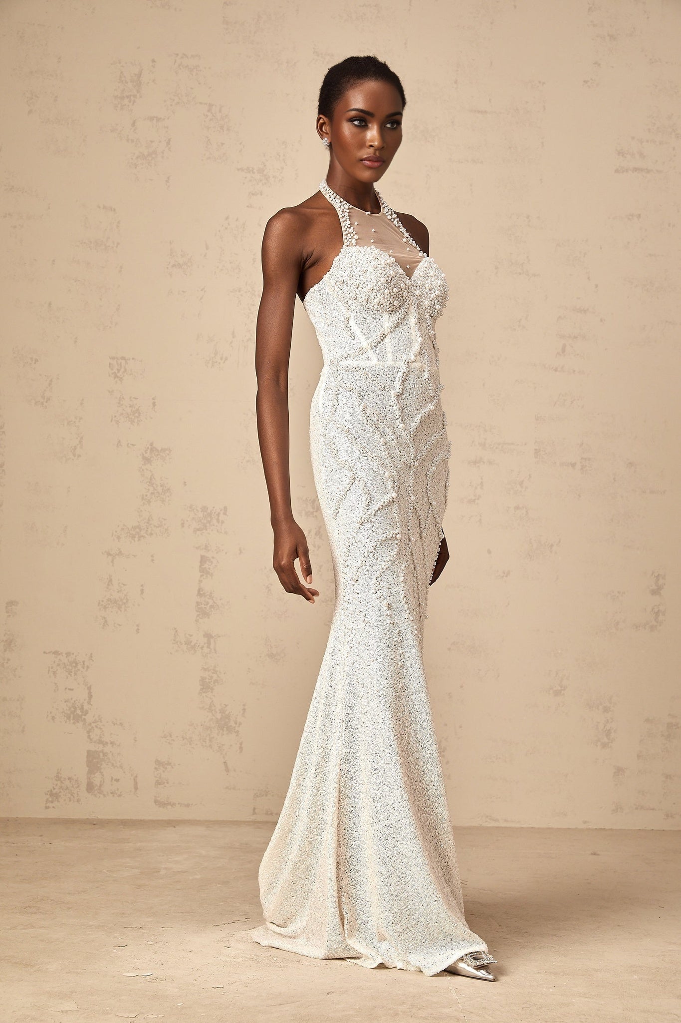 White maxi dress with faux pearl embellishments called Sophie