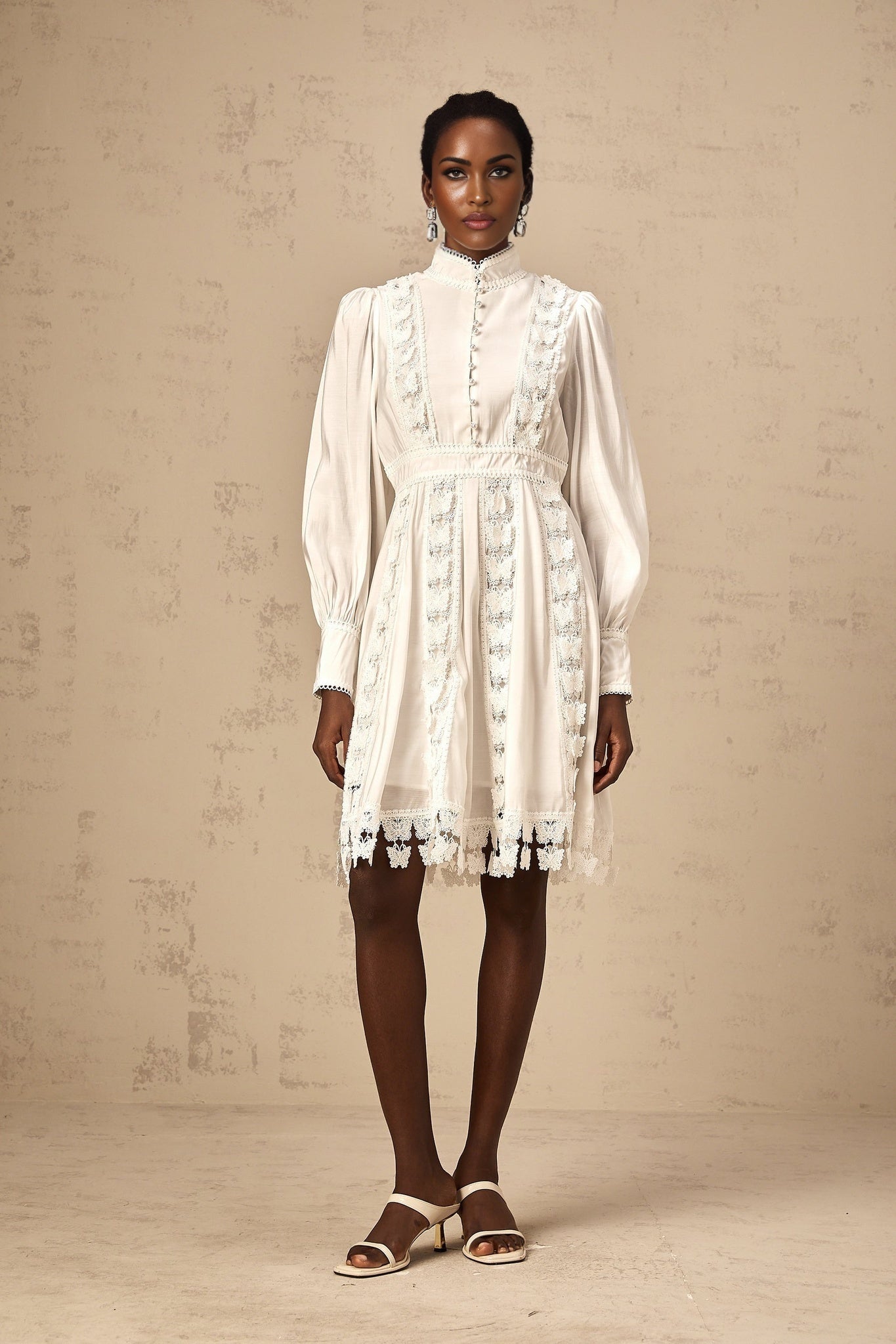 White mini dress with butterfly appliques featuring Cyrielle design