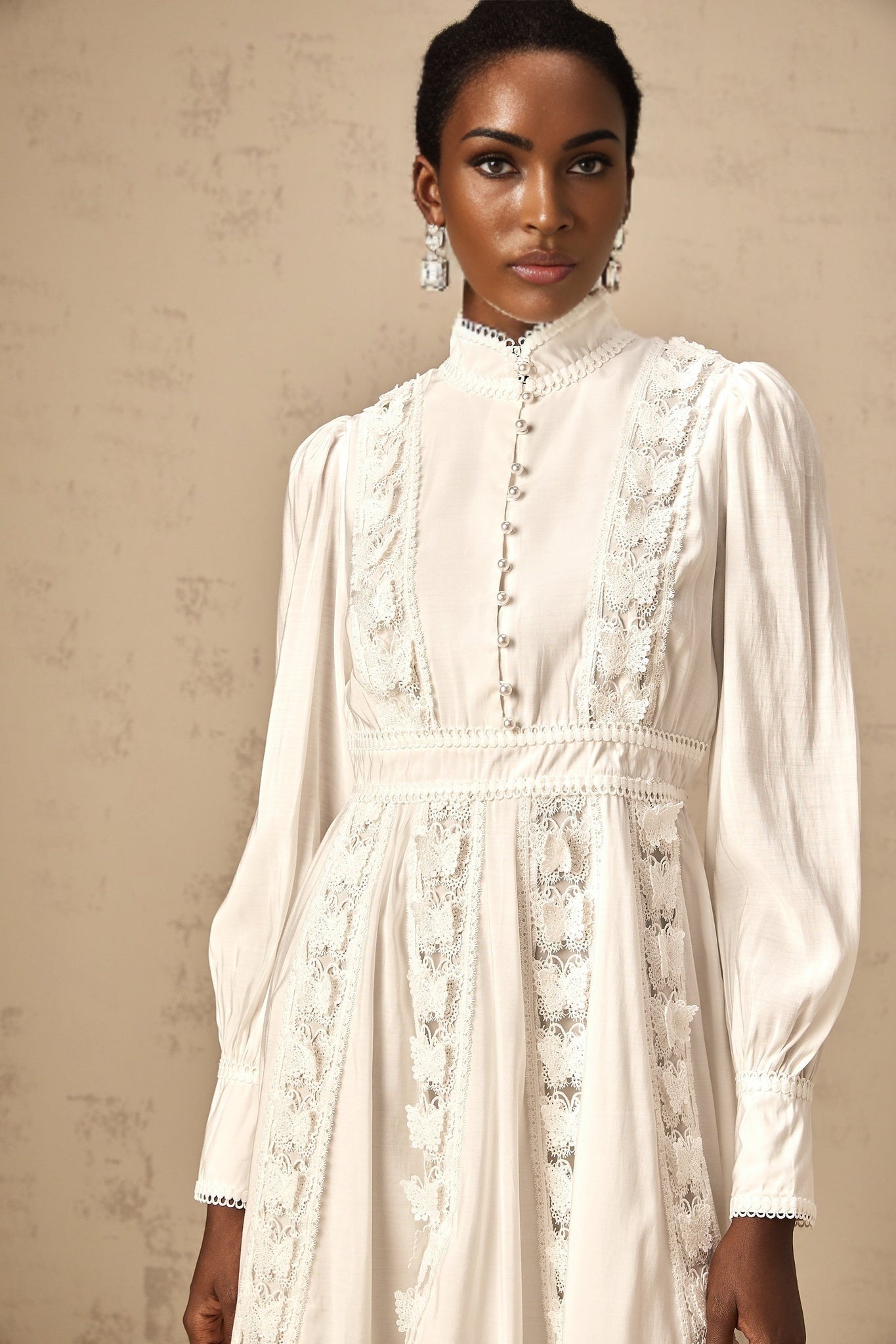 White mini dress with butterfly appliques on the fabric Cyrielle design