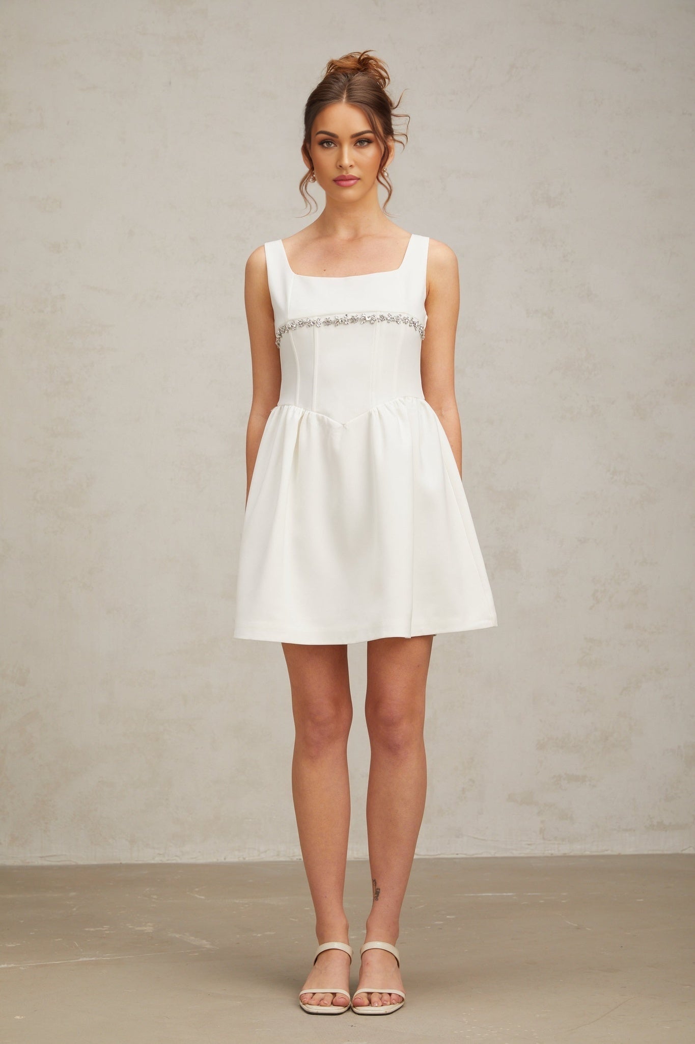 White mini dress with crystal embellishments named Flavia