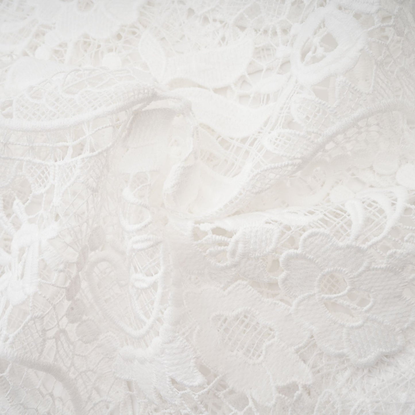 White Aline dress with crew neck long sleeves embroidered lace detail cutout design cinch waist flounce hem front button fastening and made of 70% Cotton 20% Terylene 10% Viscose