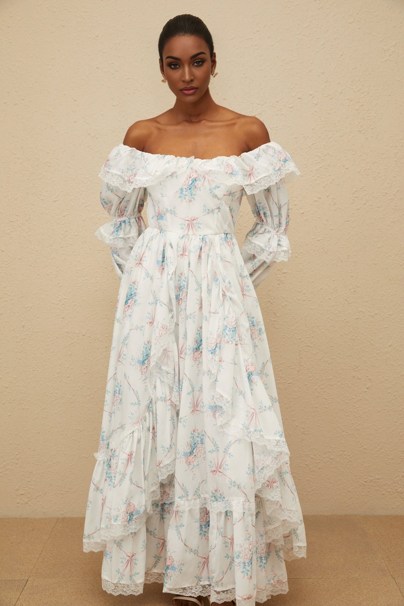 White off the shoulder long sleeve floral print maxi dress with flared cuffs and lace trim