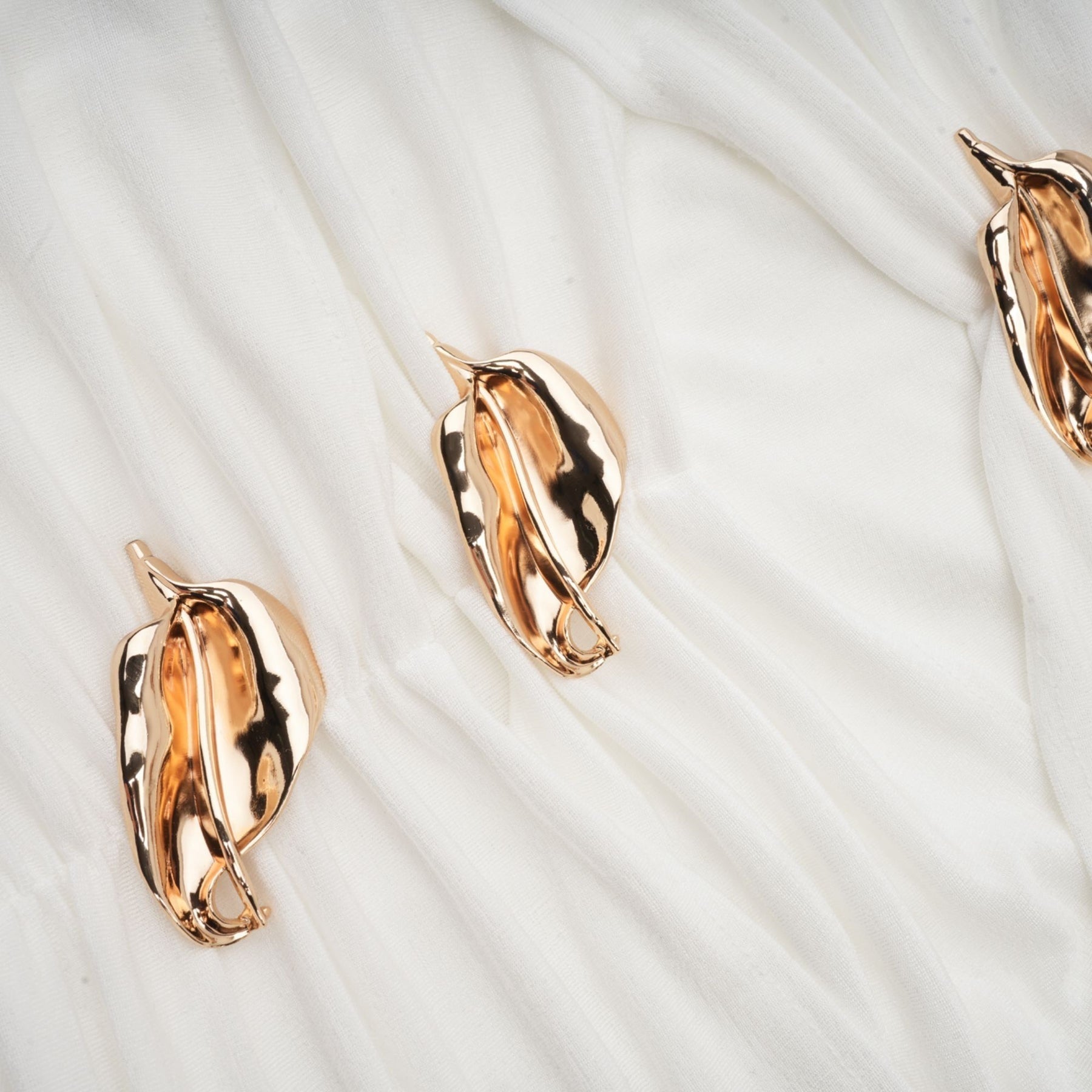 White offshoulder maxi dress with panels worn by model