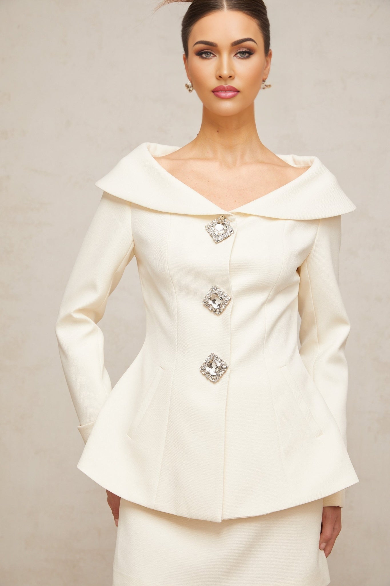 White peplum jacket and matching skirt set named Eugenie