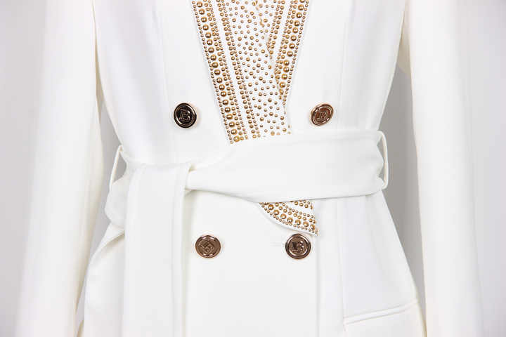 White structured double-breasted blazer with gold accents