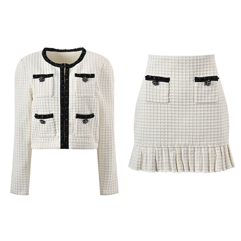 White tailored jacket and flared skirt with black accents