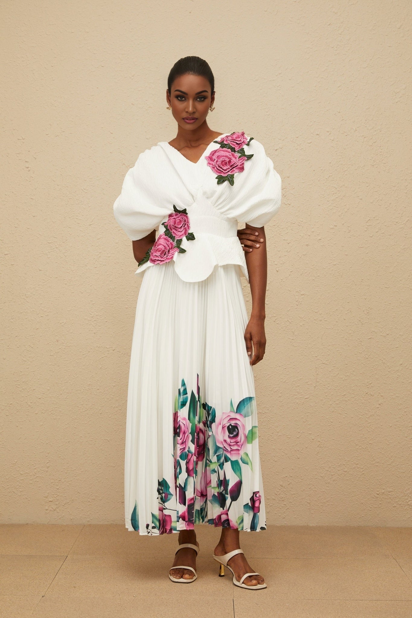 White V-neck Batwing Sleeve Floral Embroidered Shirred Effect Curved Hem Top and High Rise Pleated Rose Print Maxi Skirt in 100% Terylene Fiber