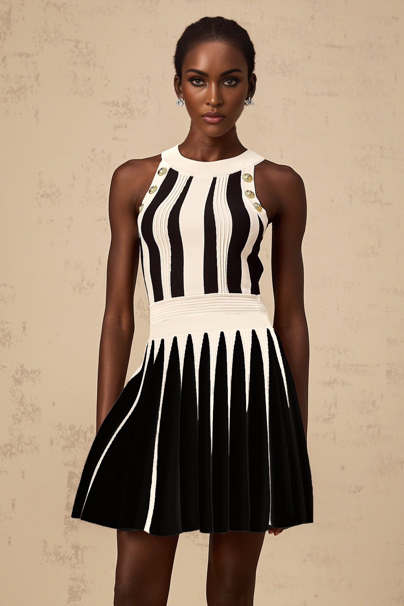 Woman wearing a striped knit top and matching skirt set in contrasting colors named Iseult
