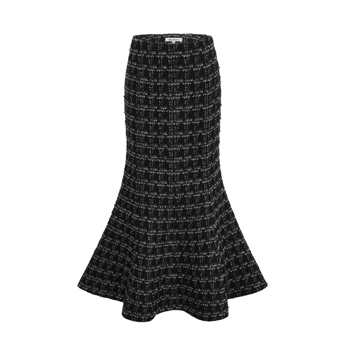 Woman wearing black and white checked tweed vest top and matching skirt set called Axelle