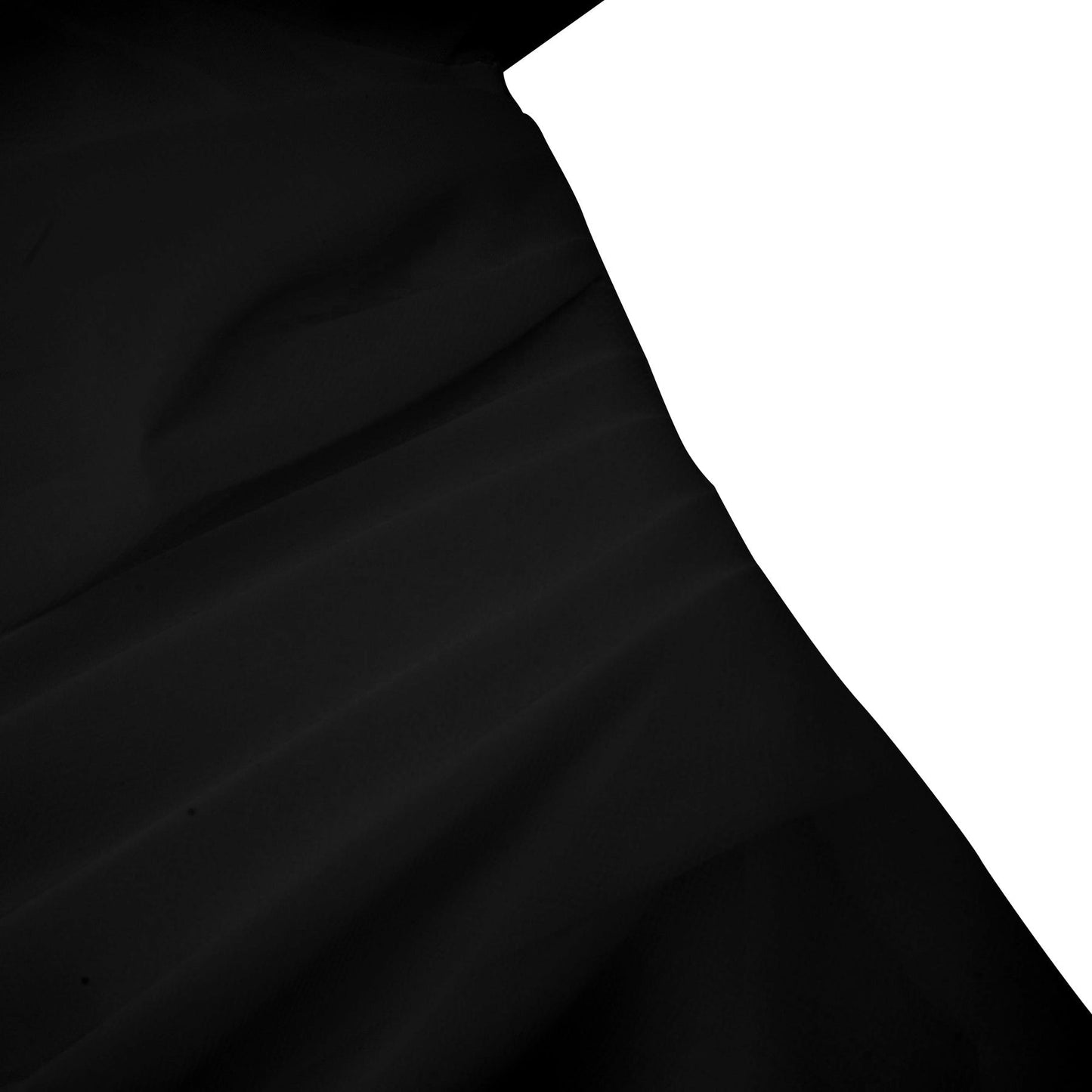 Woman wearing black asymmetric tulle blouse and matching skirt set Andrea style