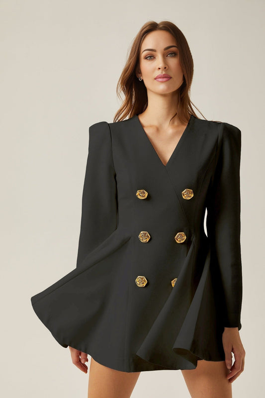 Woman wearing black blazer dress with pleated peplum hem