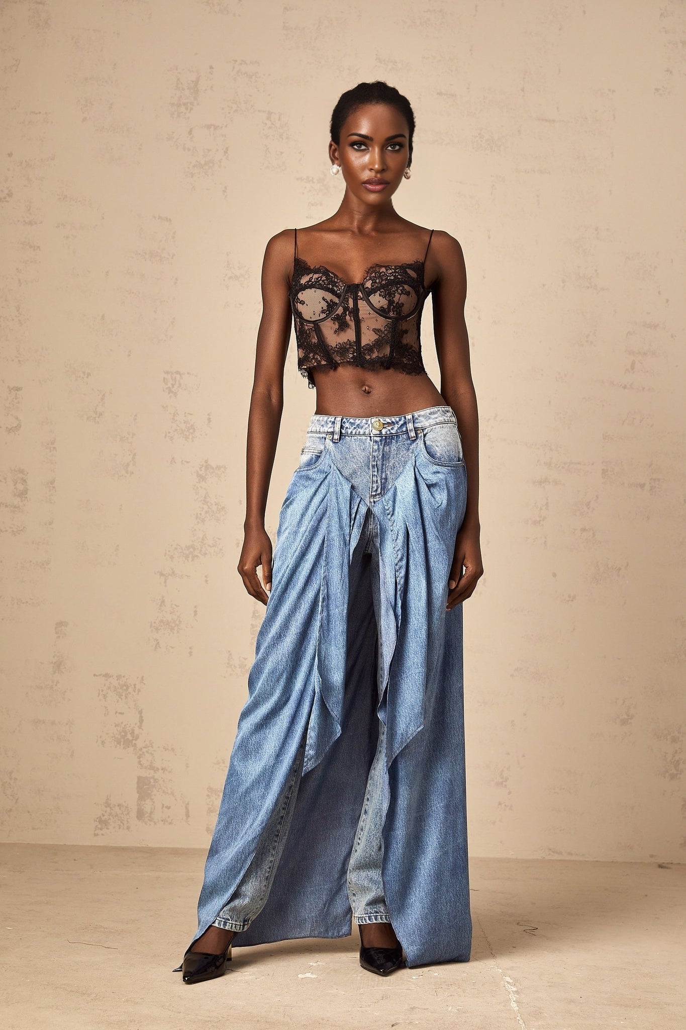 Woman wearing blue layered denim jeans styled with multiple tiers