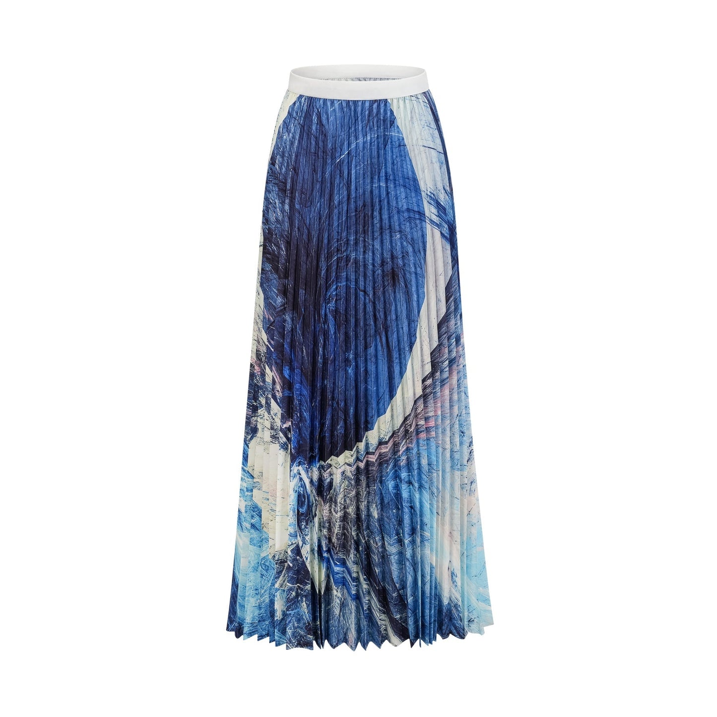 Woman wearing blue patterned cape and matching skirt set with crease details and allover print design