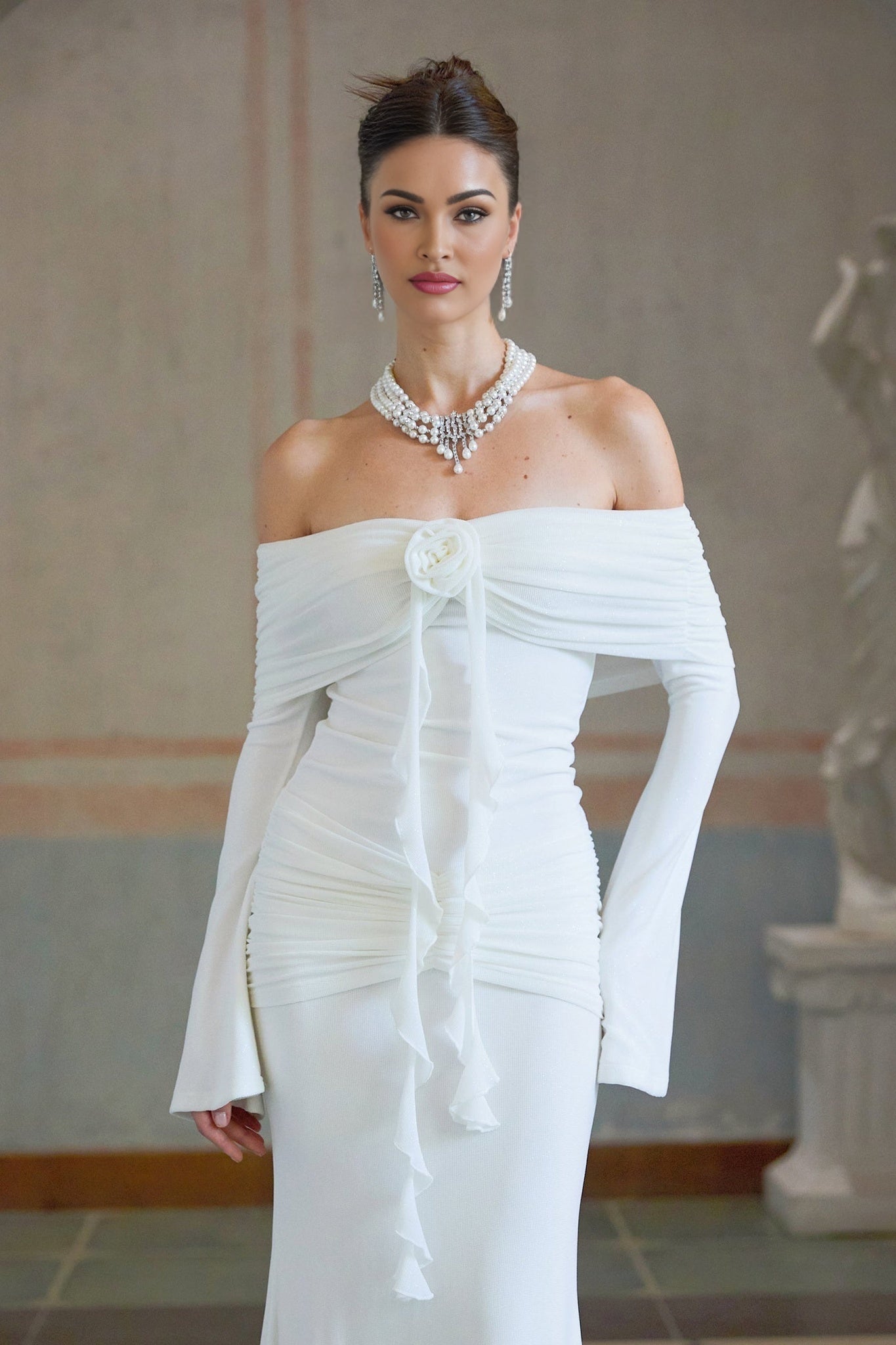 Woman wearing layered necklace with zircon stones and pearls named Catherine