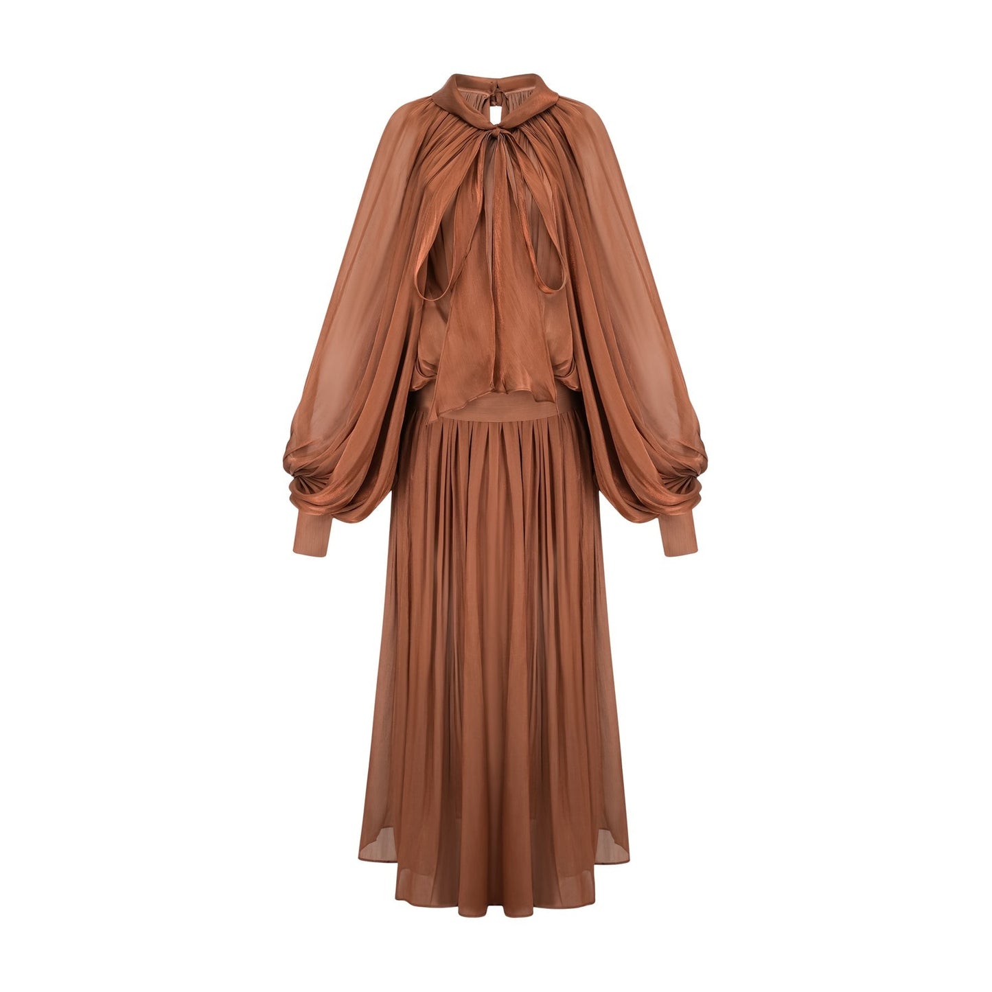 Woman wearing long brown pleated satin maxi dress with flowing skirt and fitted bodice