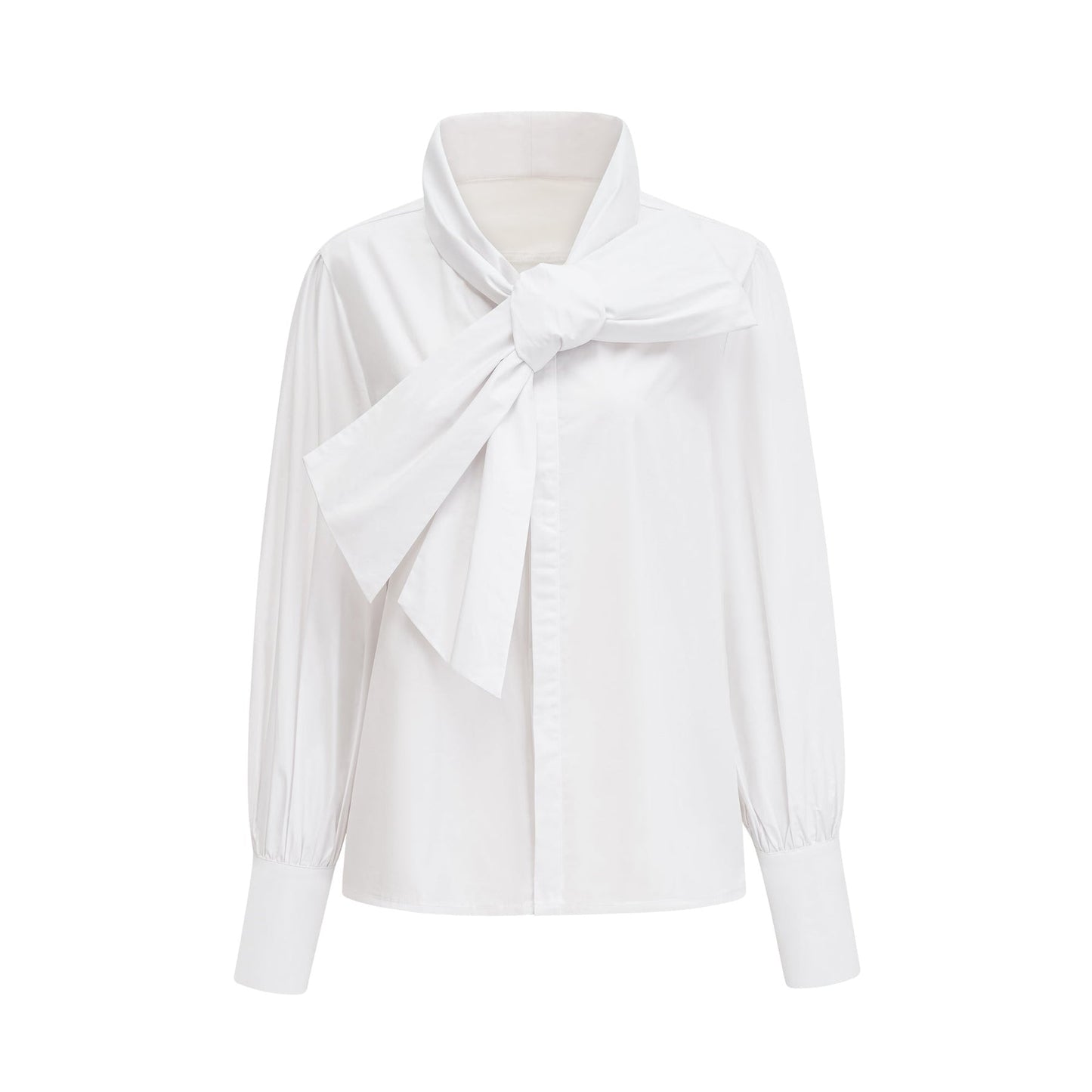 Woman wearing white cotton buttonup shirt with tie front detail and long sleeves