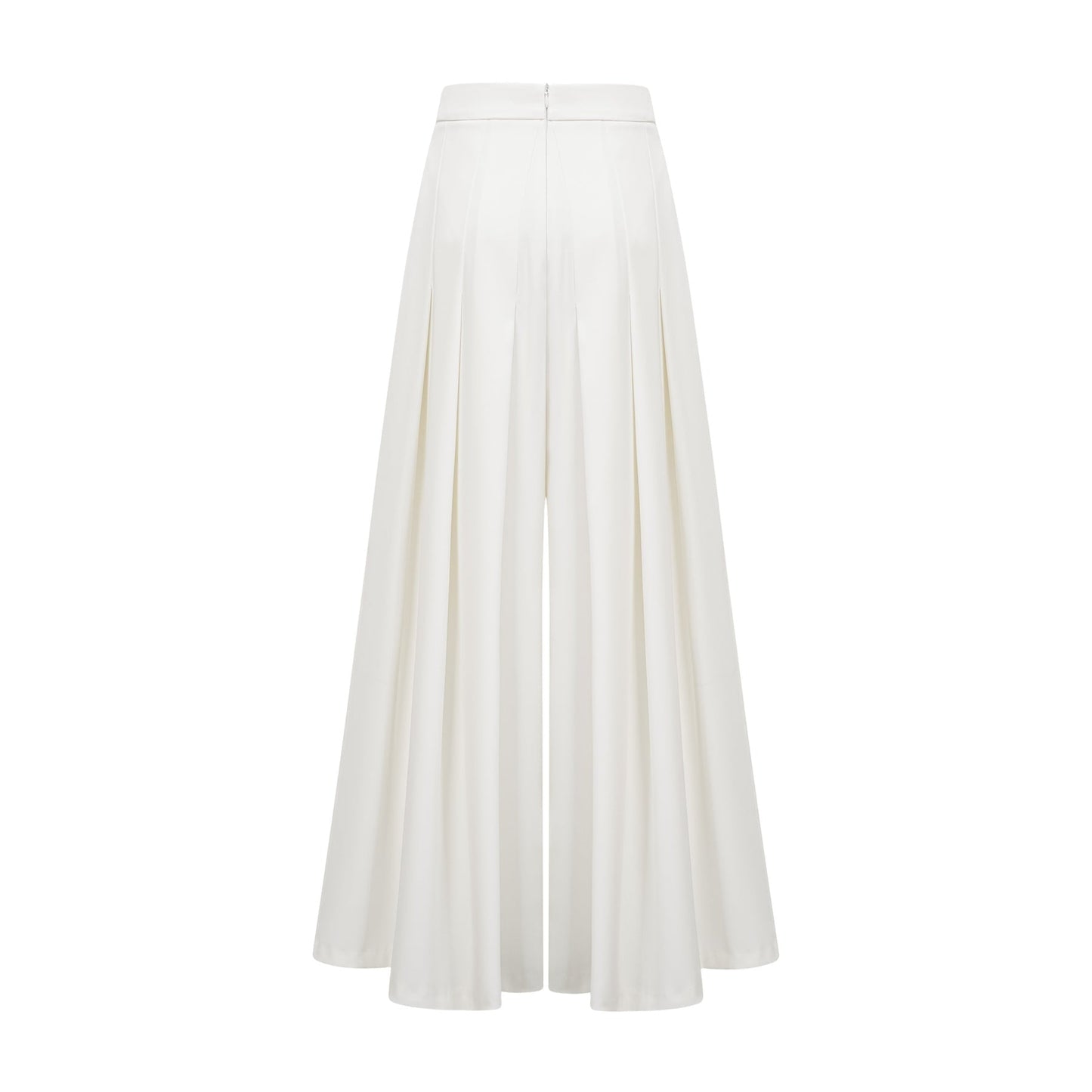 Woman wearing white creased top and matching trousers set Adele style outfit