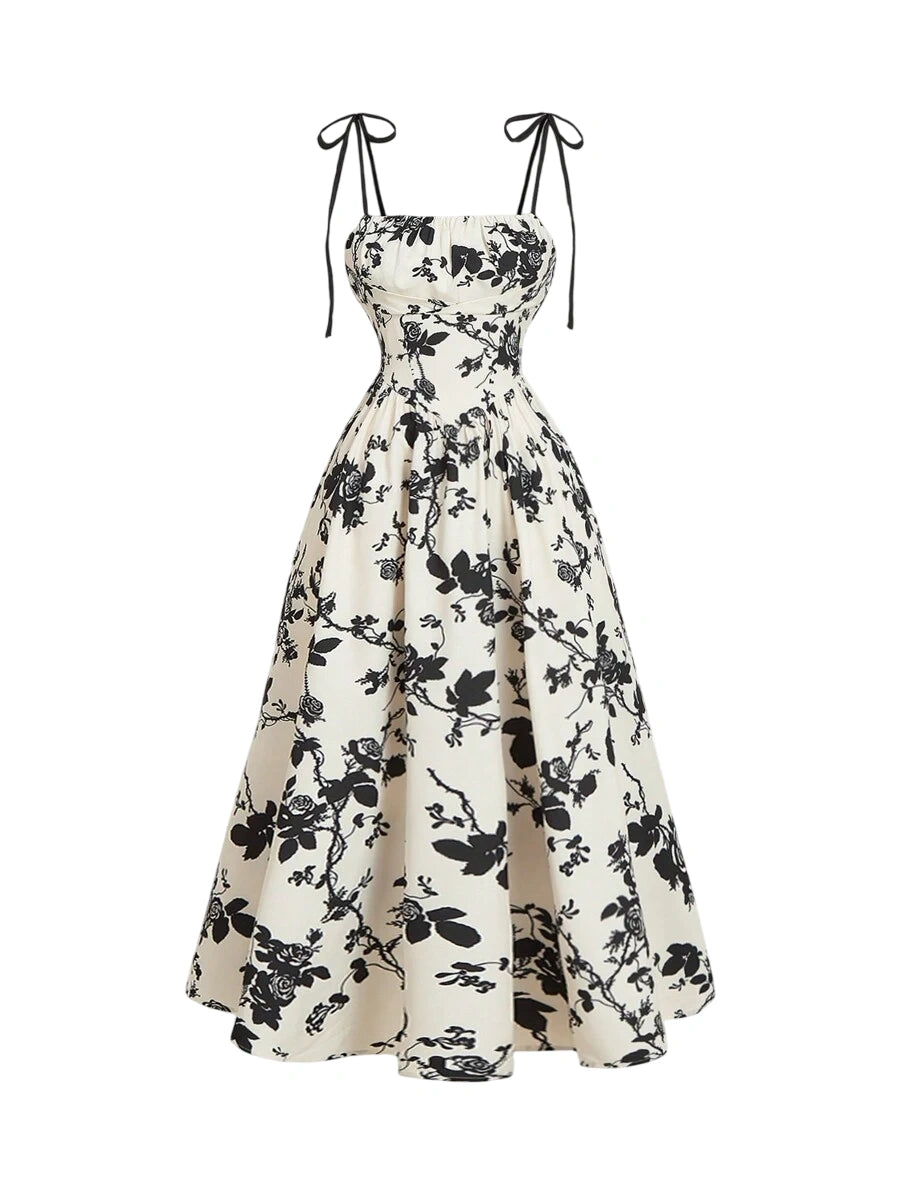 Floral print maxi dress with tie straps and a flowing vintage-inspired silhouette