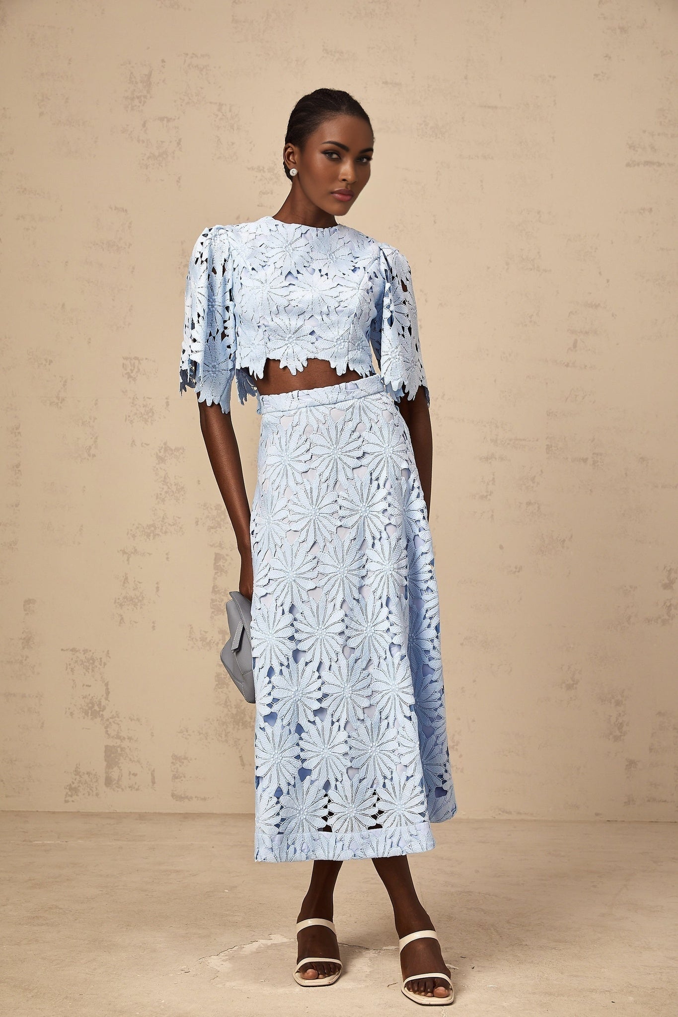 Womens blue lace matching top and skirt set with intricate guipure pattern named Audrey