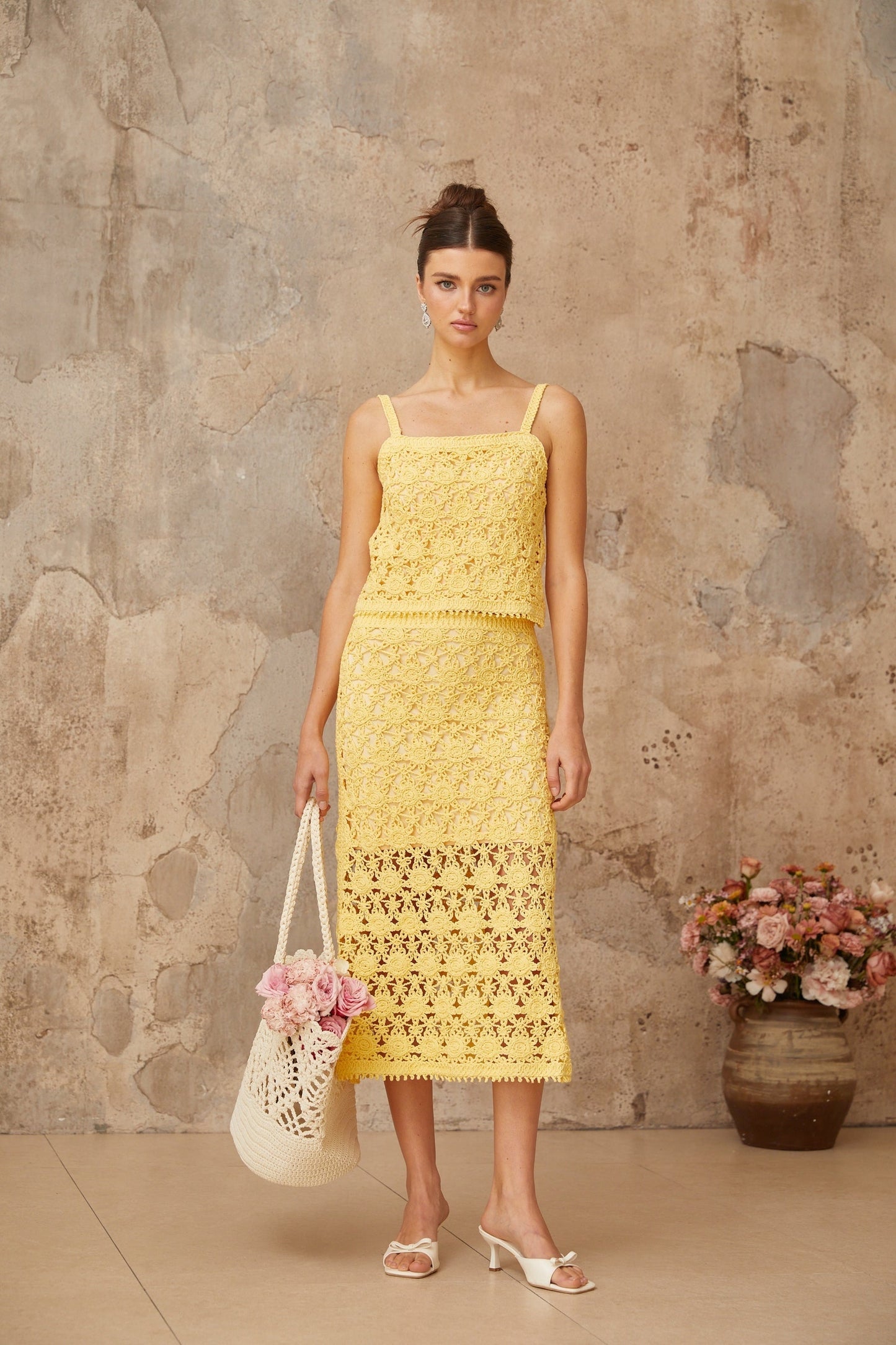Yellow crochet knit matching set with sleeveless top and skirt Isoline brand summer outfit