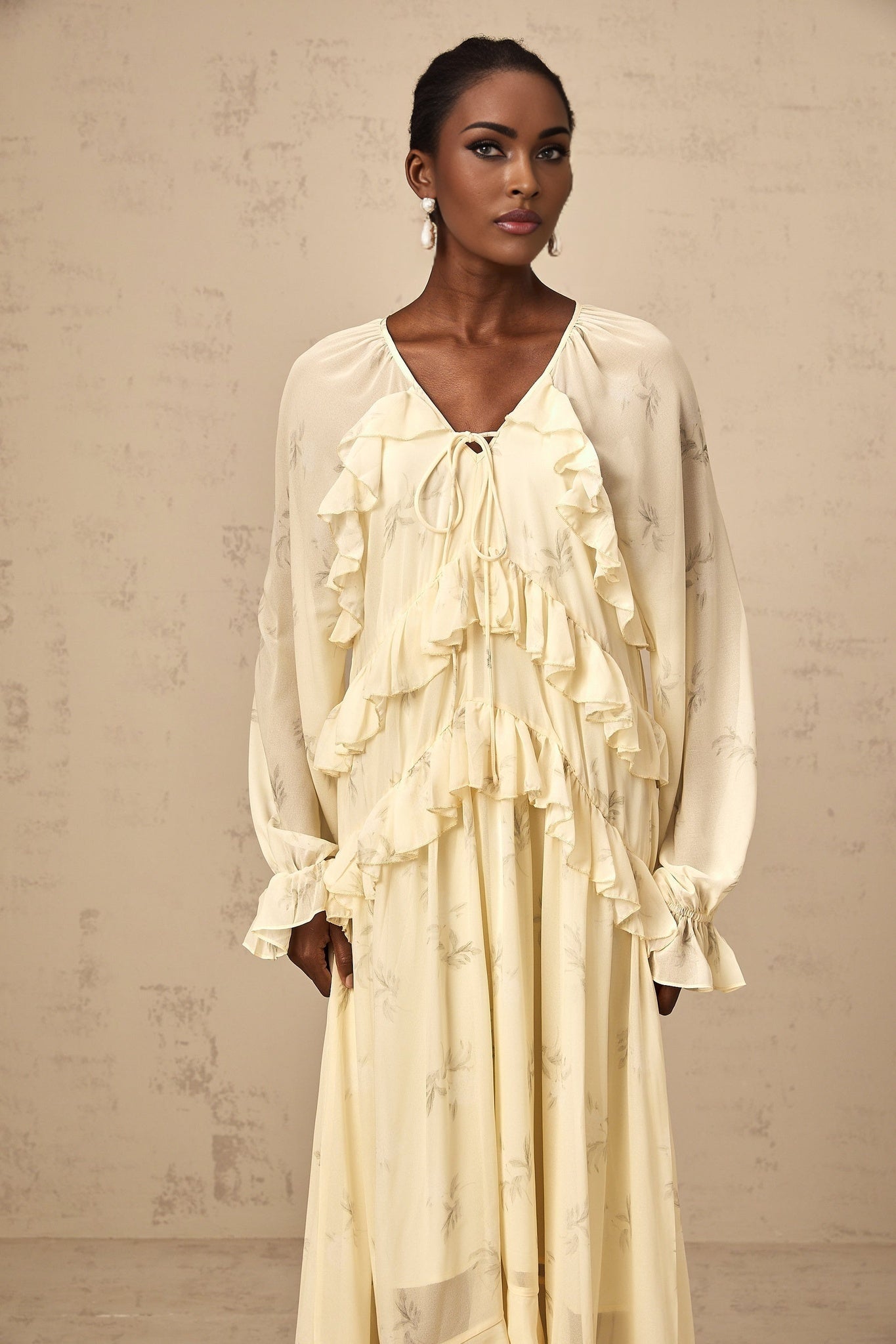 Yellow floral print midi dress with ruffles and chiffon fabric named Oriane