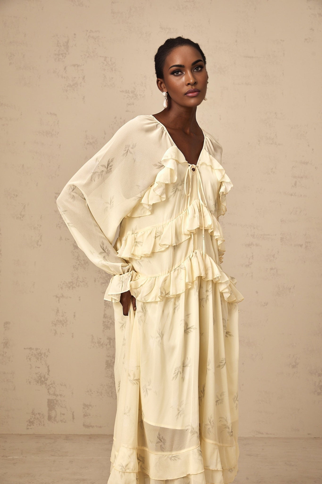 Yellow floral print midi dress with ruffles made of chiffon fabric named Oriane