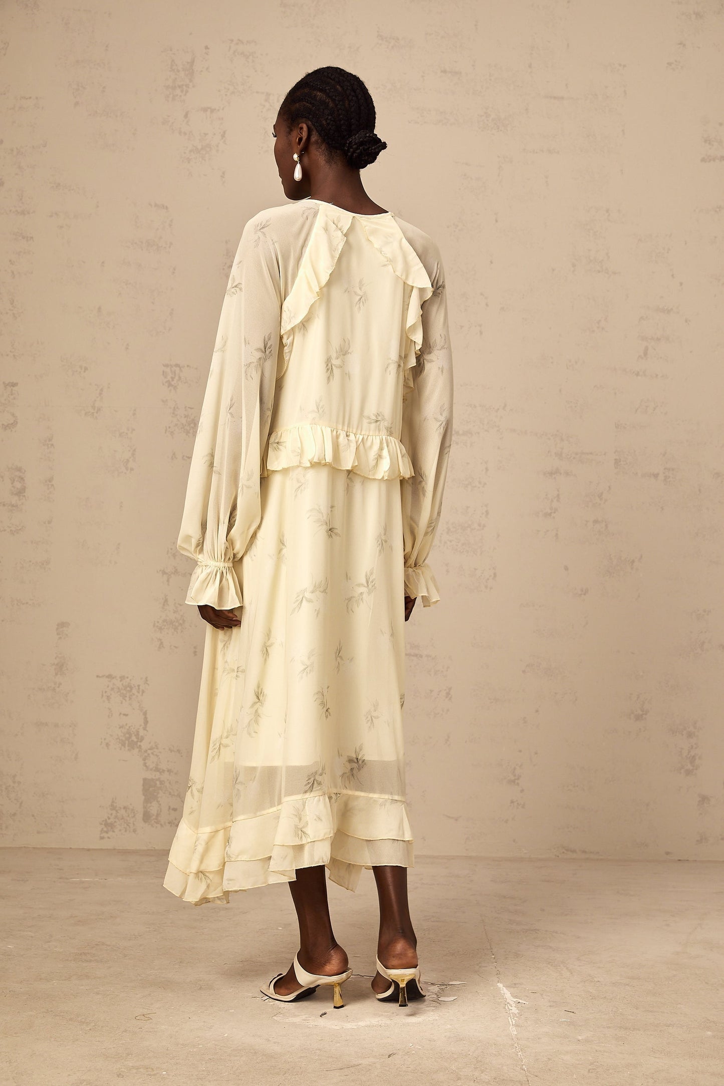Yellow floral print midi dress with ruffles made of chiffon fabric named Oriane
