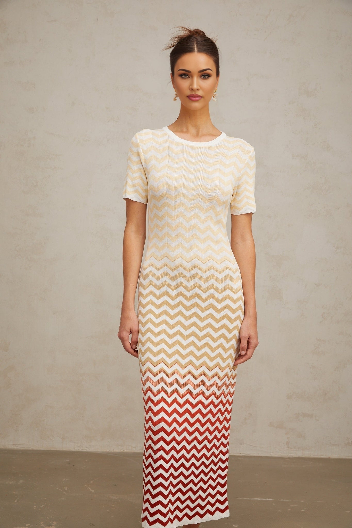 Yellow knit midi dress with zigzag pattern named Isabelle