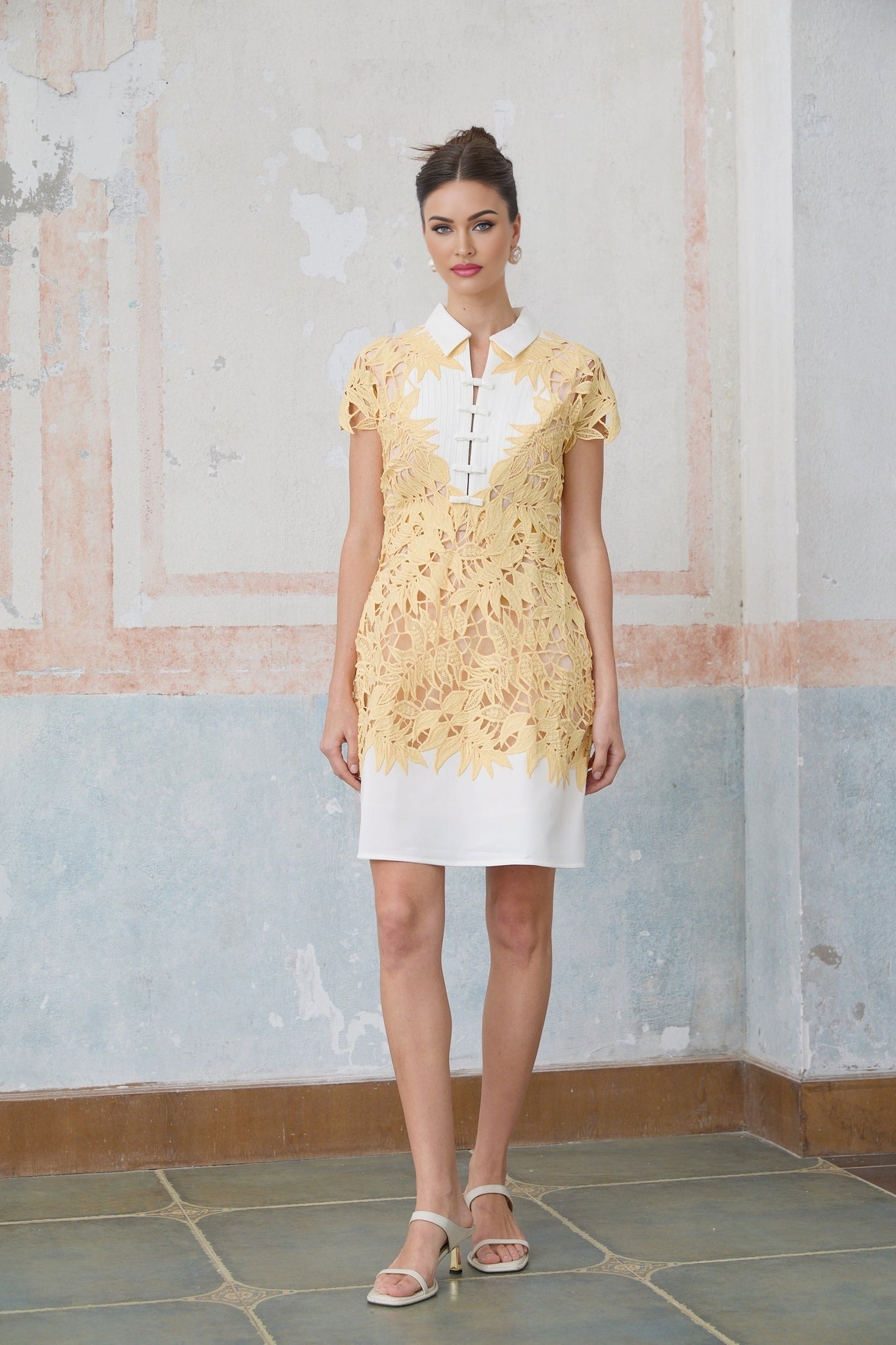 Yellow mini dress with leaf applique detailing named Camille