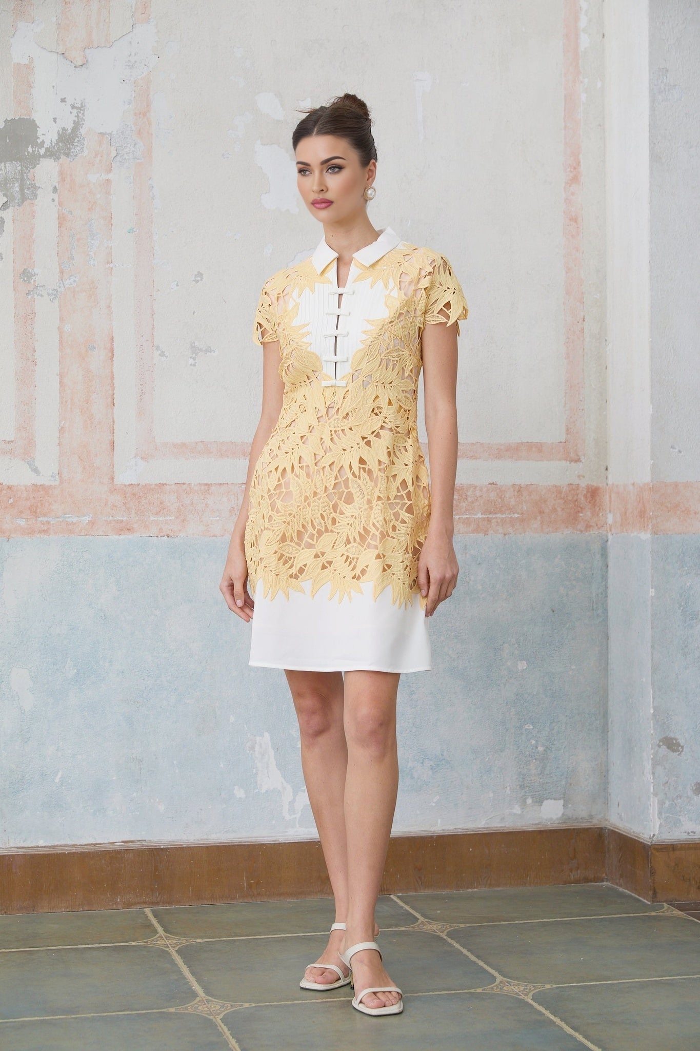 Yellow mini dress with leaf applique details named Camille