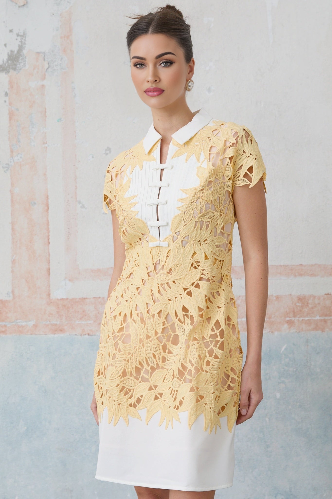 Yellow mini dress with leaf applique details named Camille