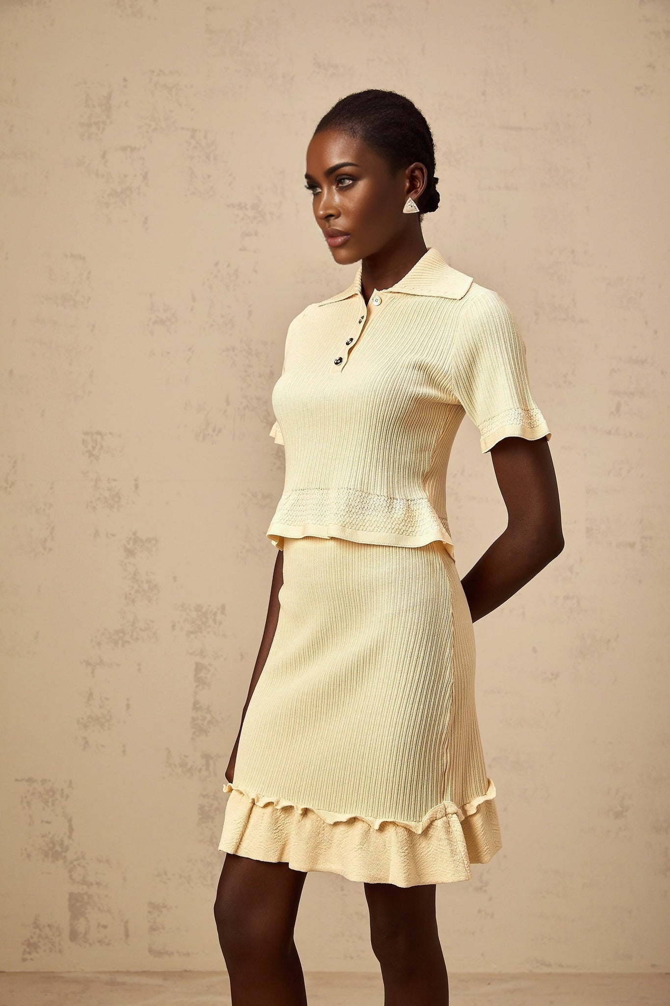 Yellow ruffled ribbed knit top and skirt matching set with feminine details